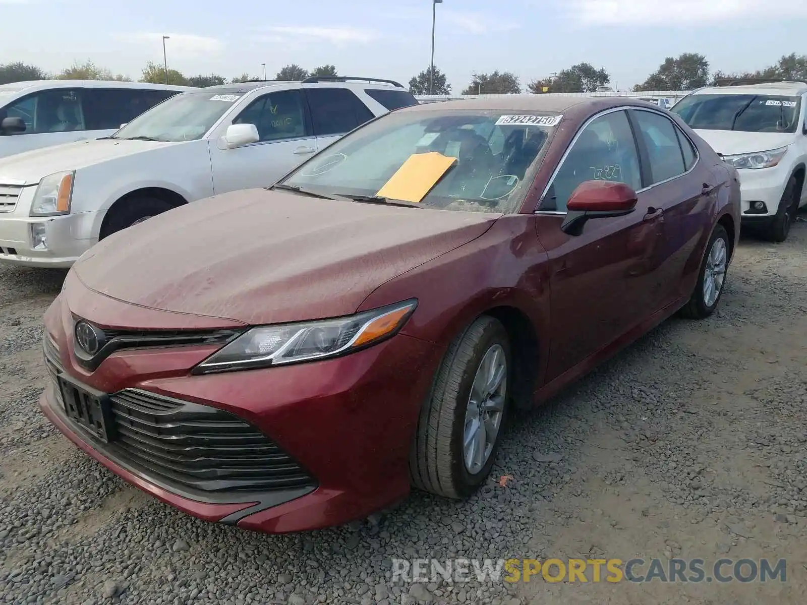 2 Photograph of a damaged car 4T1B11HK4KU774986 TOYOTA CAMRY 2019