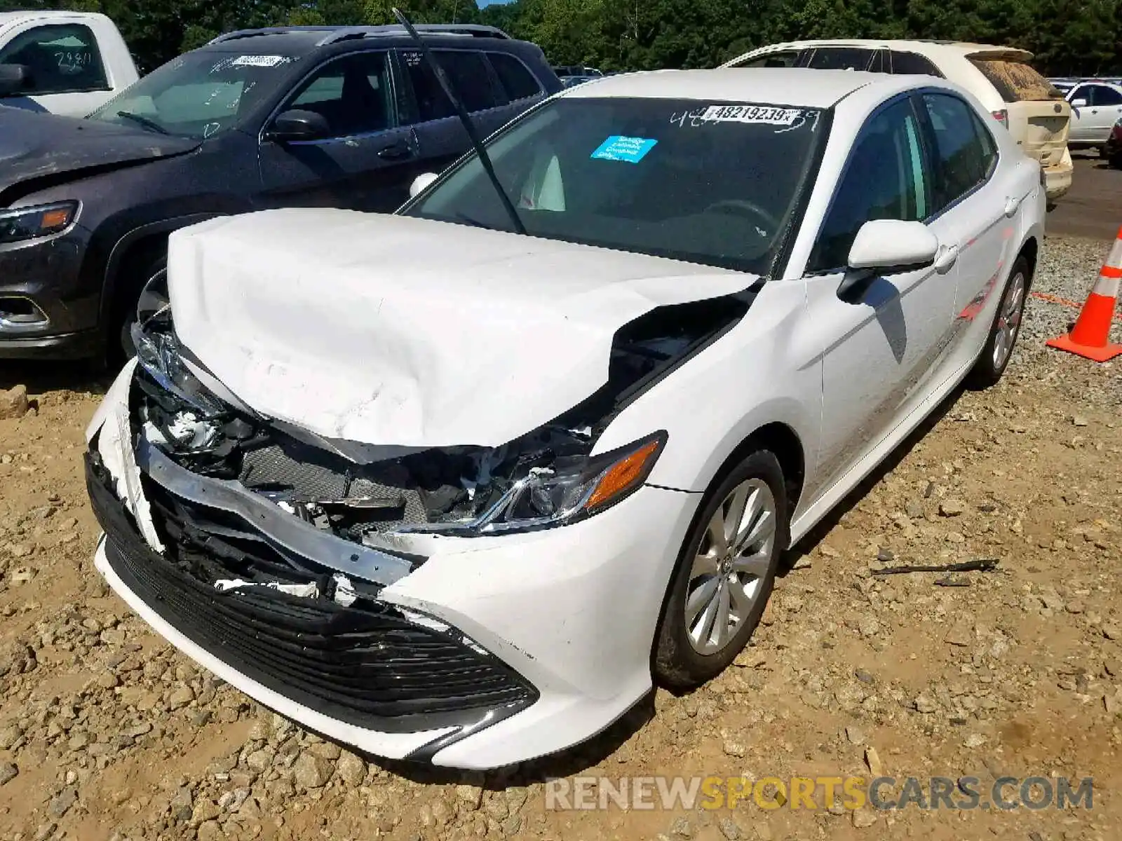 2 Photograph of a damaged car 4T1B11HK4KU775653 TOYOTA CAMRY 2019