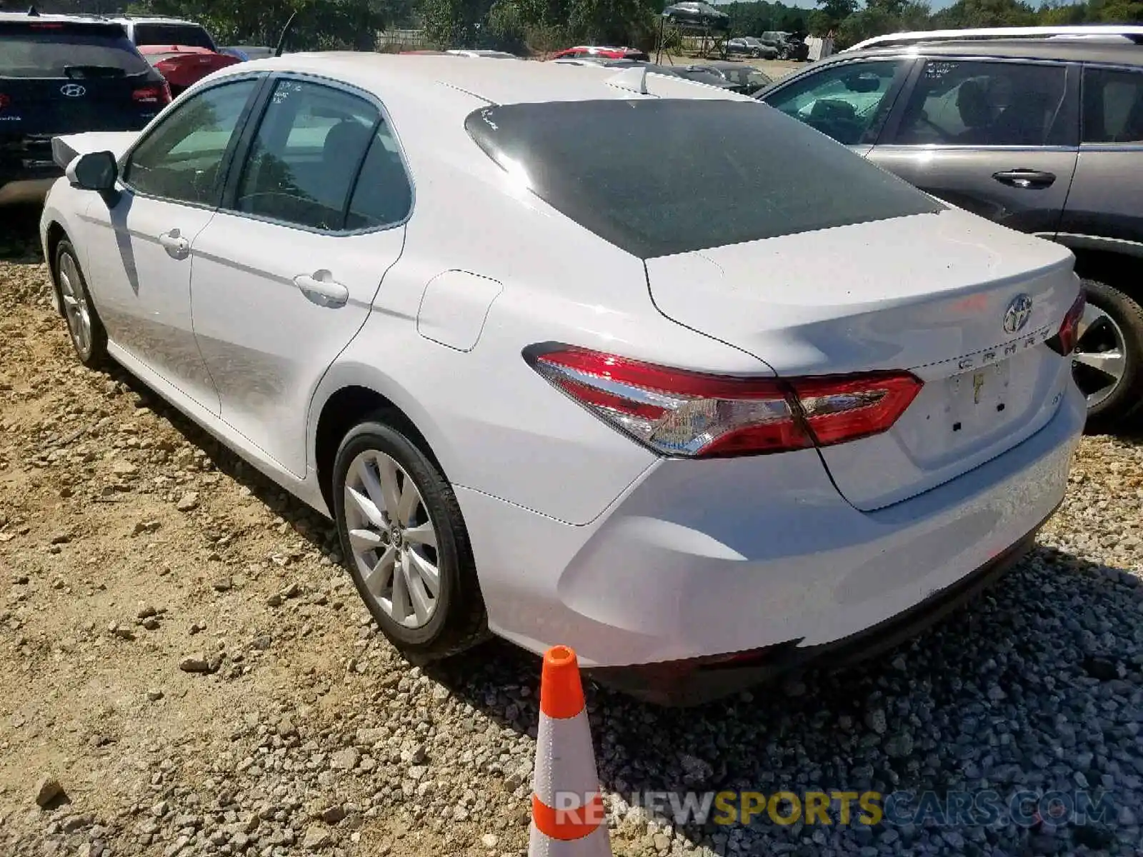 3 Photograph of a damaged car 4T1B11HK4KU775653 TOYOTA CAMRY 2019