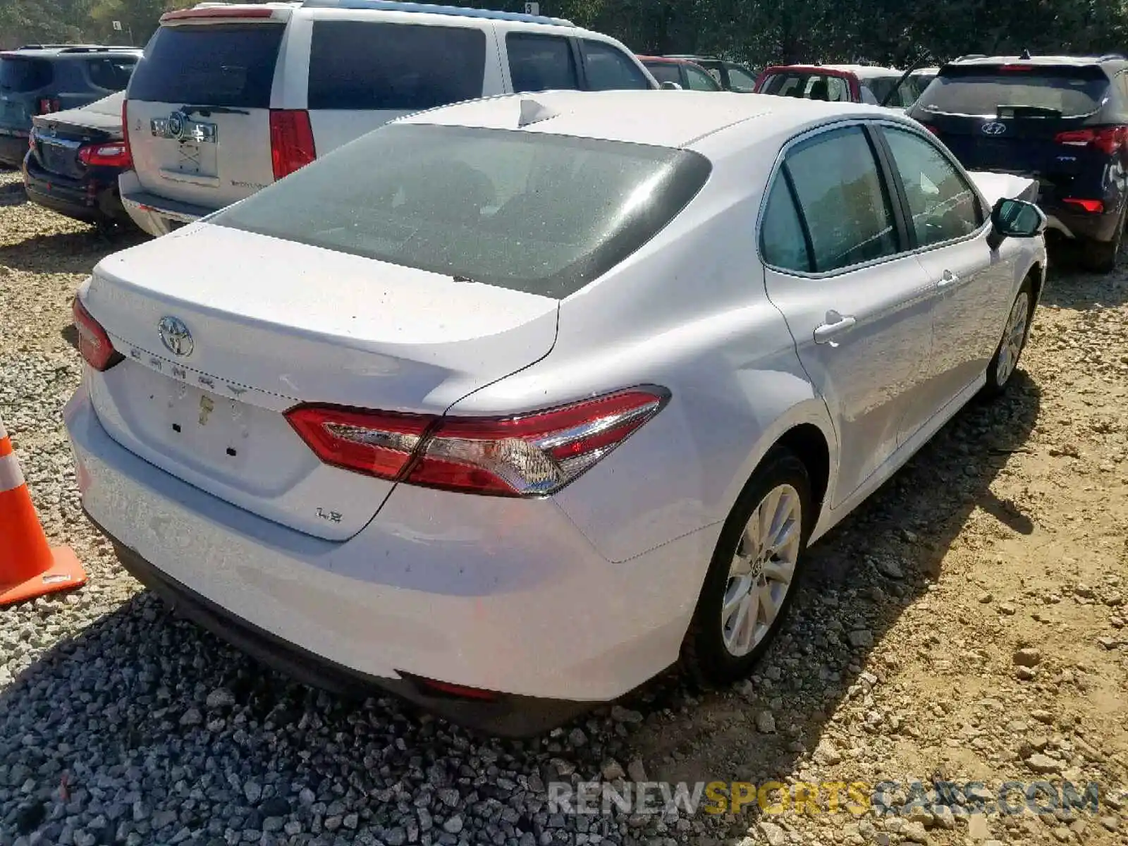 4 Photograph of a damaged car 4T1B11HK4KU775653 TOYOTA CAMRY 2019