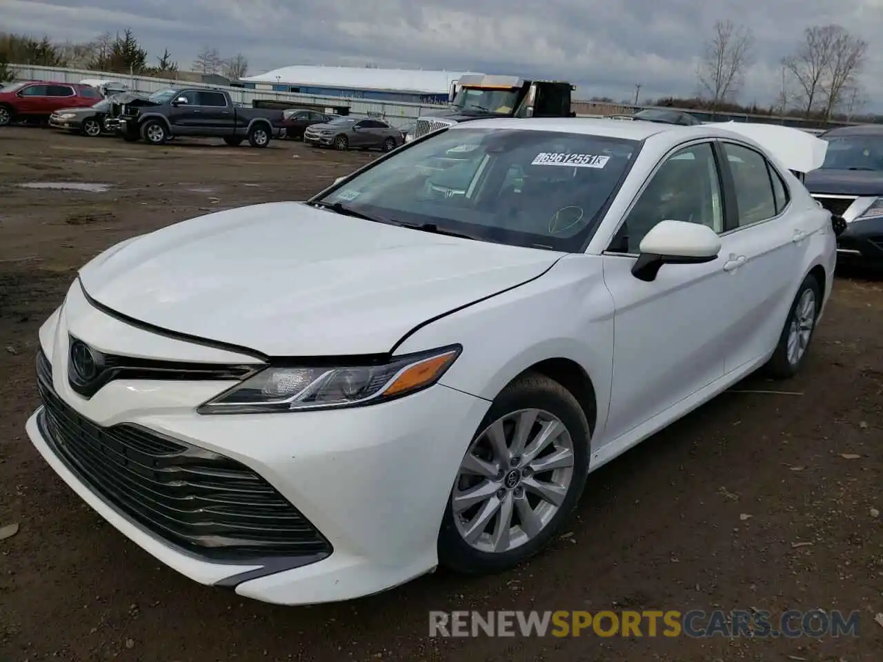 2 Photograph of a damaged car 4T1B11HK4KU776009 TOYOTA CAMRY 2019