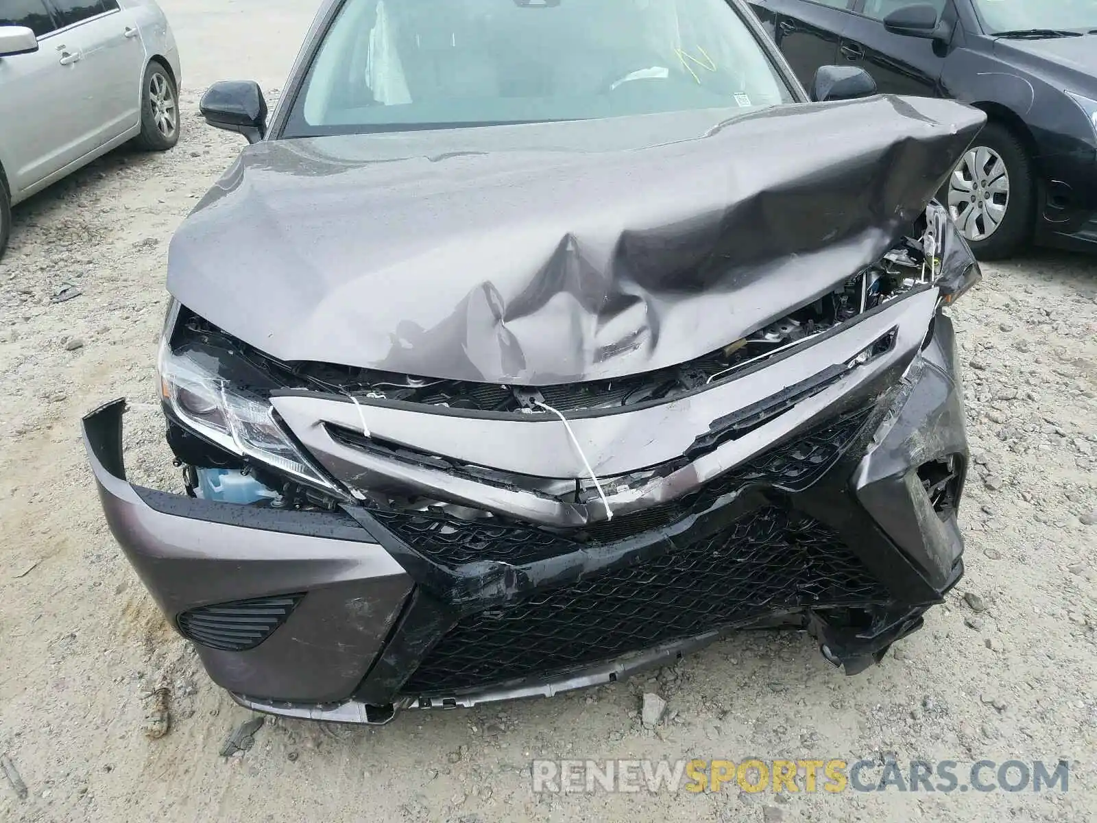 7 Photograph of a damaged car 4T1B11HK4KU776558 TOYOTA CAMRY 2019