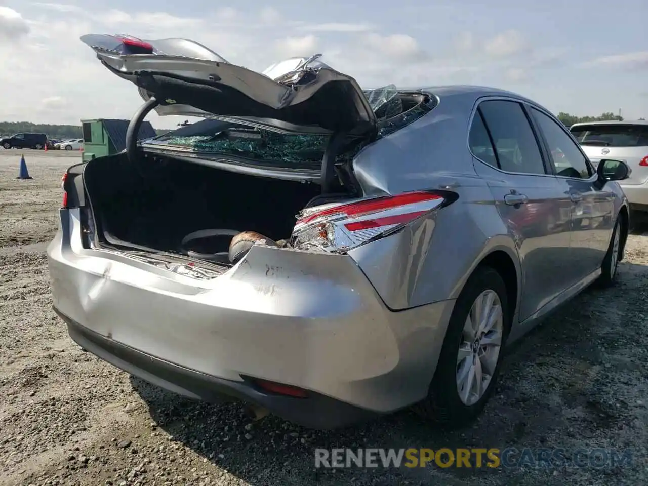 4 Photograph of a damaged car 4T1B11HK4KU778553 TOYOTA CAMRY 2019