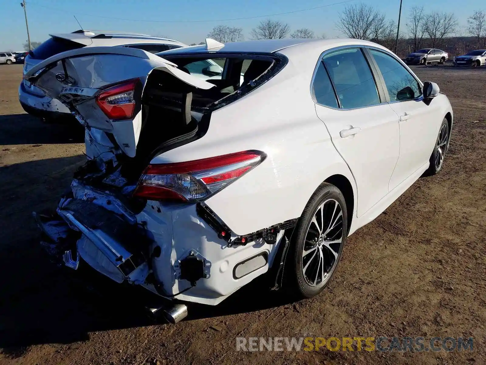 4 Photograph of a damaged car 4T1B11HK4KU778892 TOYOTA CAMRY 2019