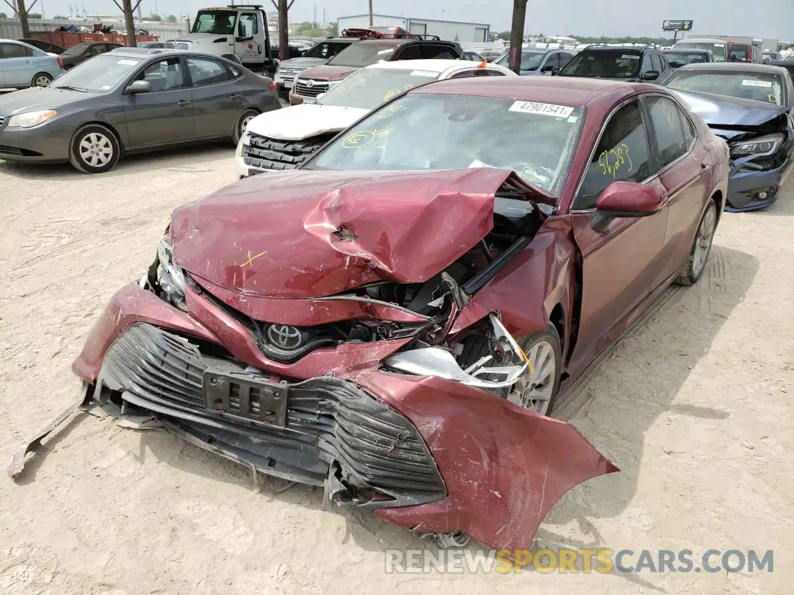 2 Photograph of a damaged car 4T1B11HK4KU778908 TOYOTA CAMRY 2019