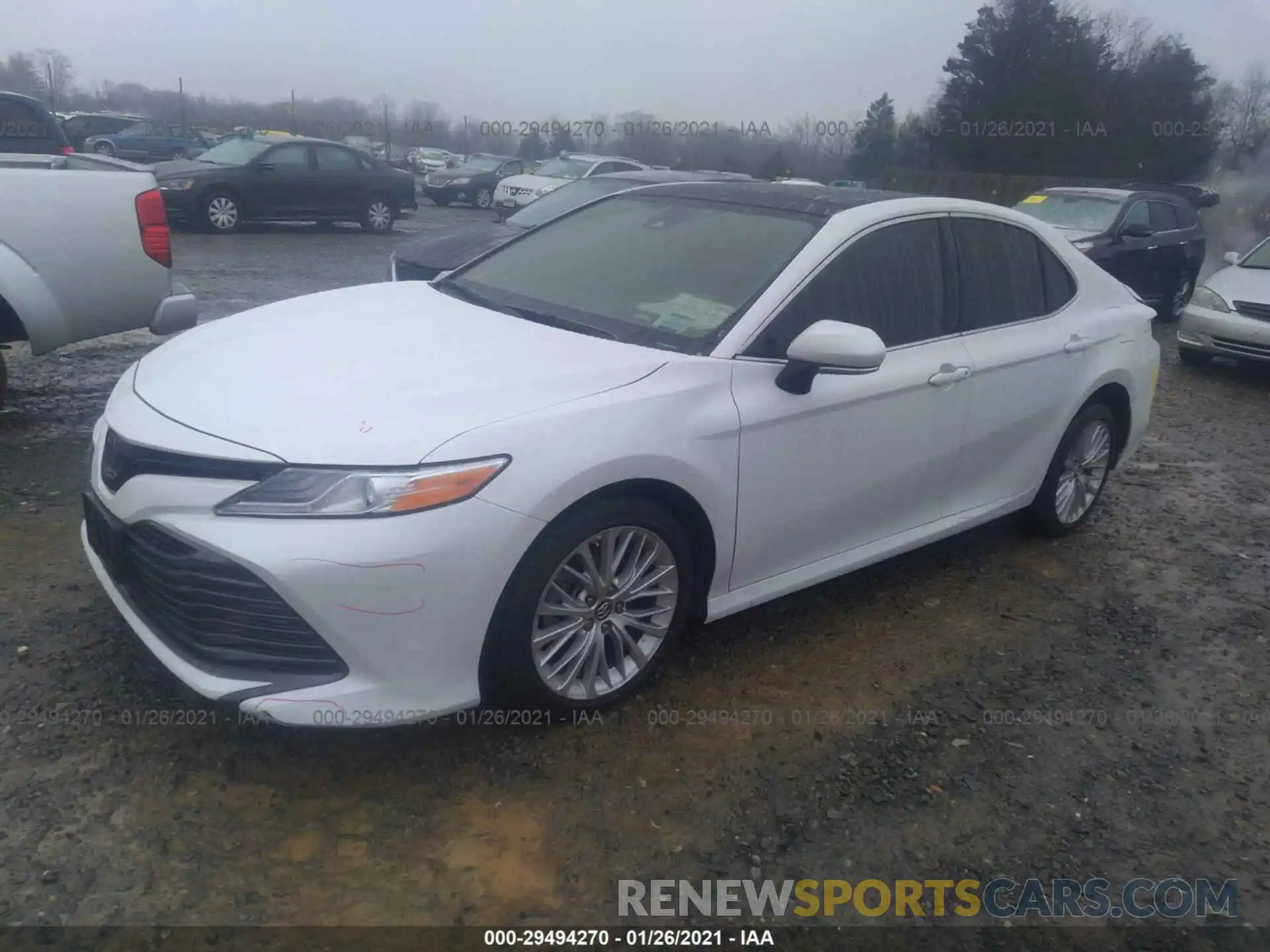 2 Photograph of a damaged car 4T1B11HK4KU779086 TOYOTA CAMRY 2019