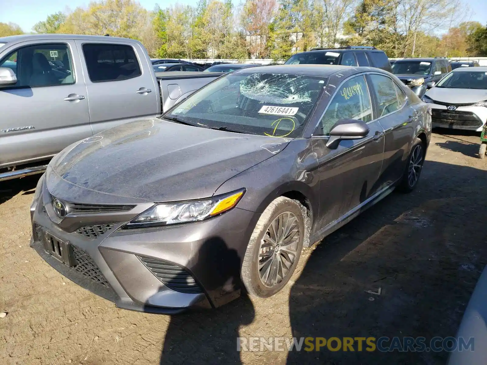 2 Photograph of a damaged car 4T1B11HK4KU779511 TOYOTA CAMRY 2019