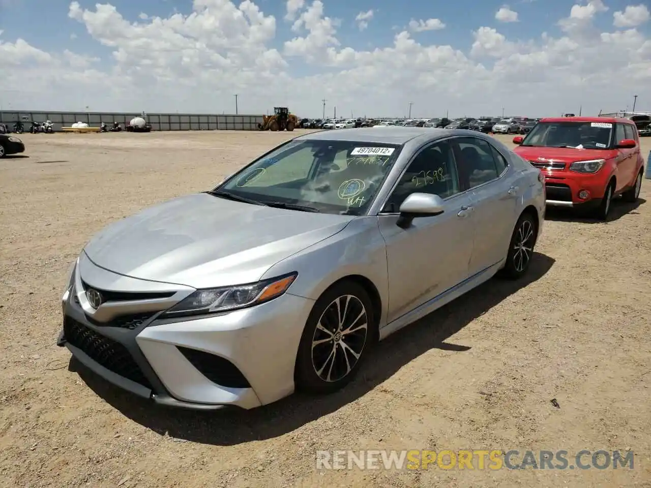 2 Photograph of a damaged car 4T1B11HK4KU779637 TOYOTA CAMRY 2019