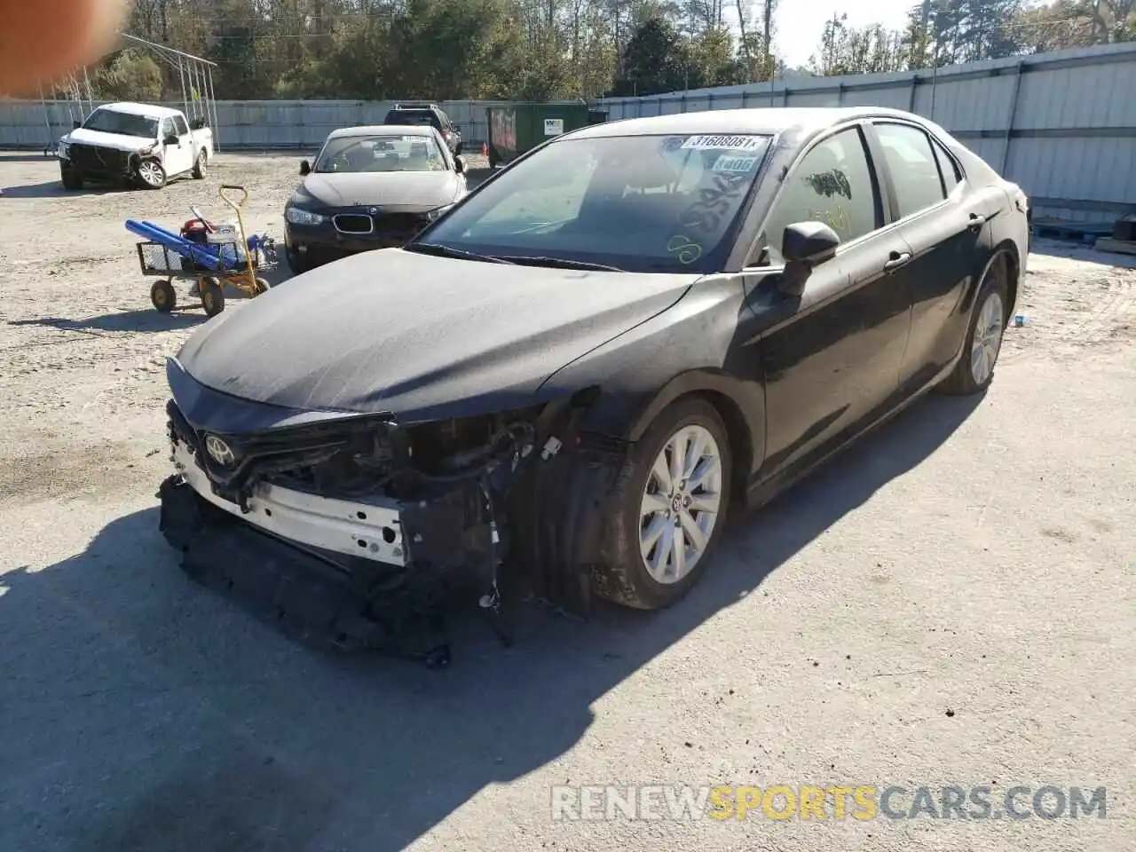 2 Photograph of a damaged car 4T1B11HK4KU783901 TOYOTA CAMRY 2019