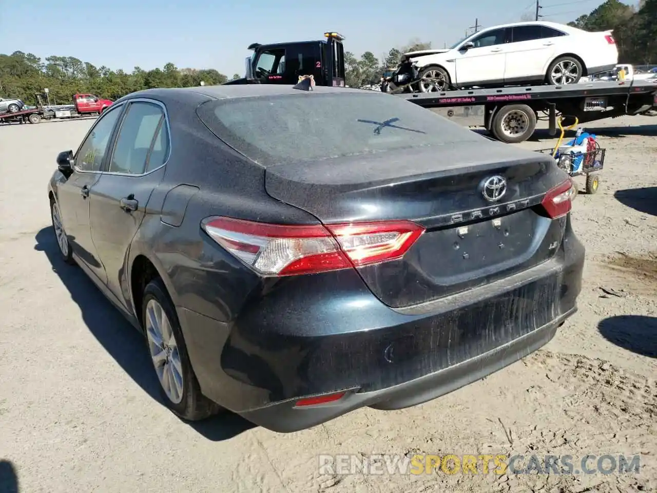 3 Photograph of a damaged car 4T1B11HK4KU783901 TOYOTA CAMRY 2019