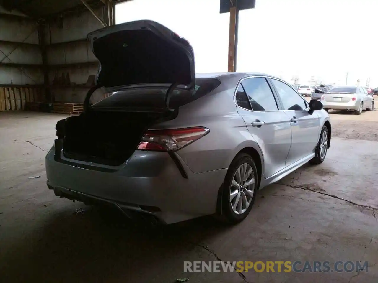 4 Photograph of a damaged car 4T1B11HK4KU785034 TOYOTA CAMRY 2019