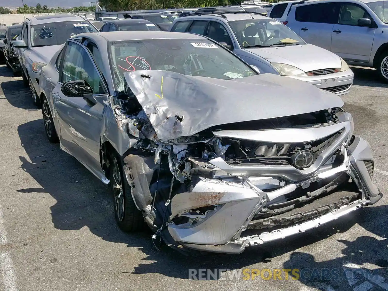 1 Photograph of a damaged car 4T1B11HK4KU785762 TOYOTA CAMRY 2019