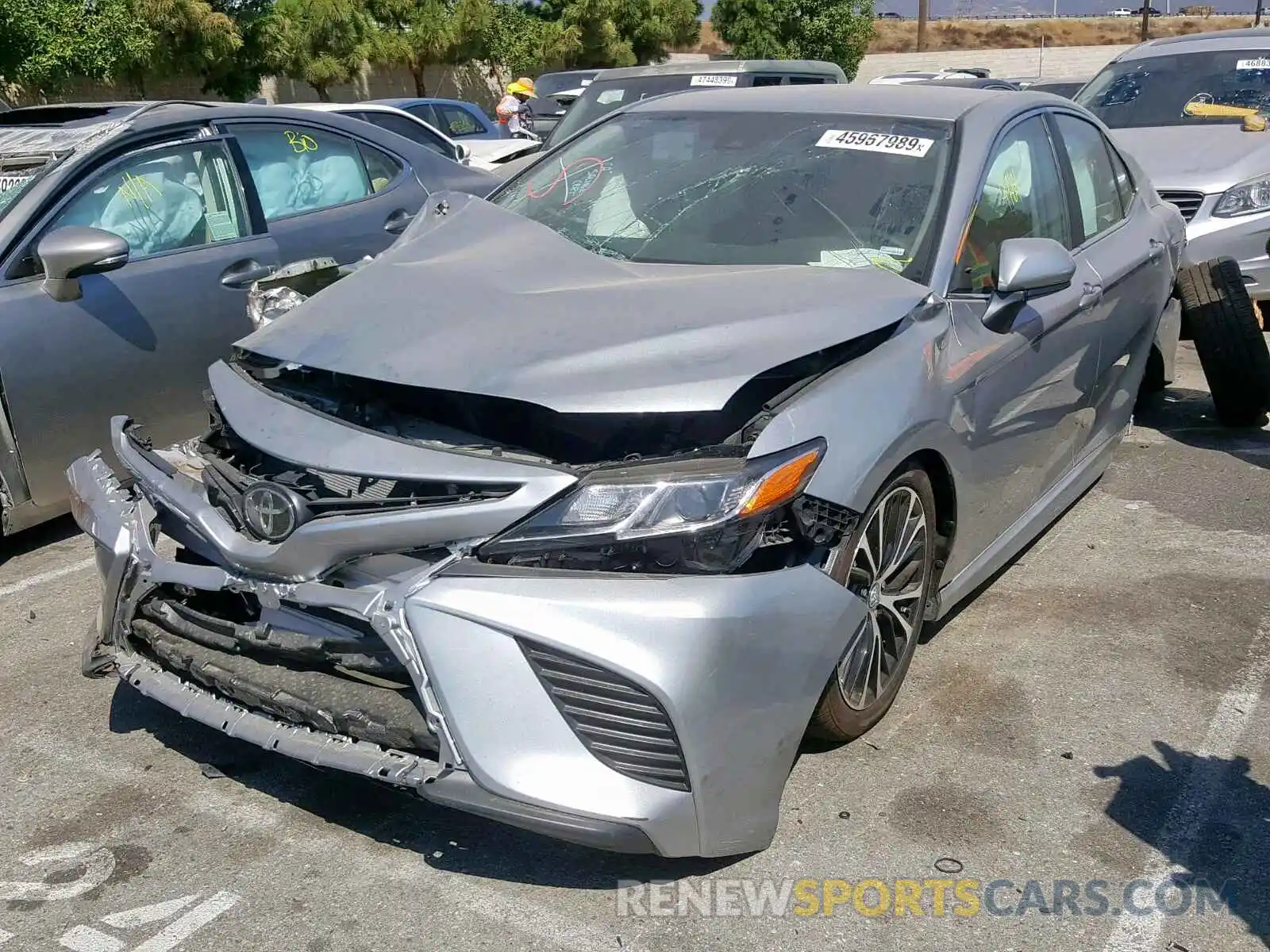 2 Photograph of a damaged car 4T1B11HK4KU785762 TOYOTA CAMRY 2019