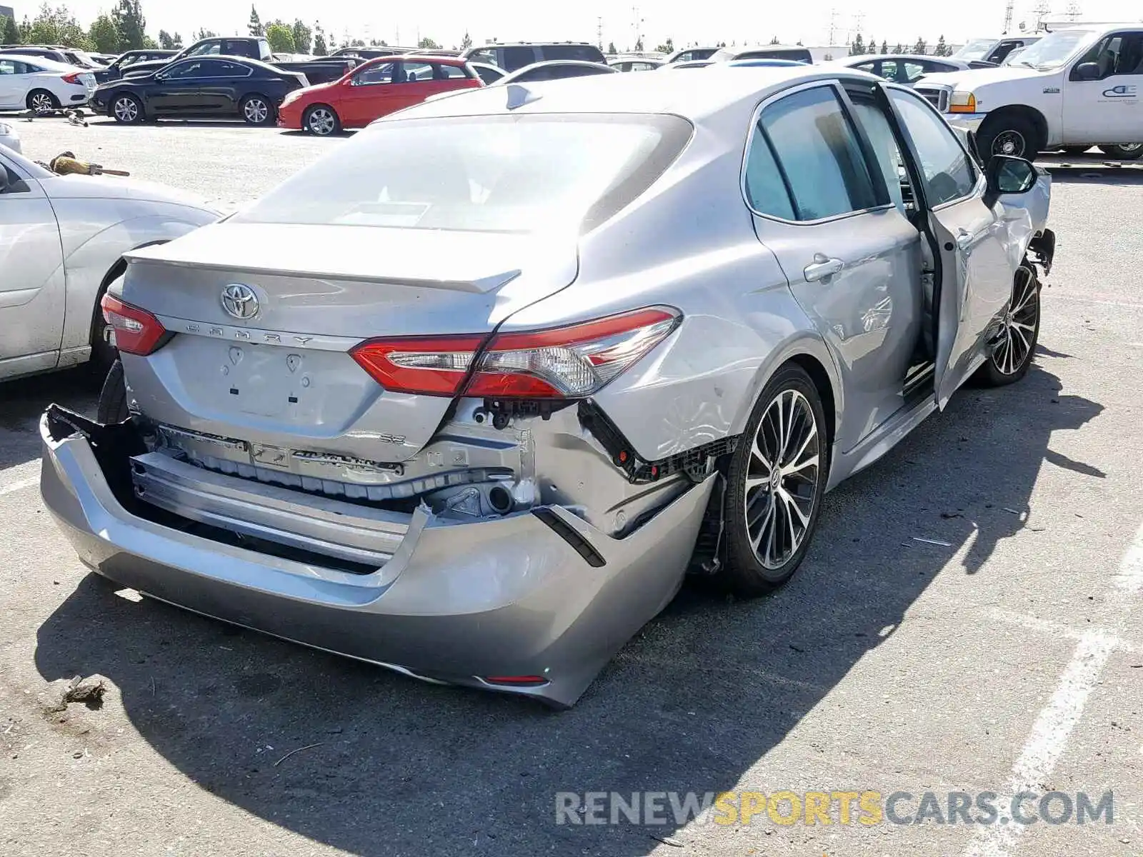 4 Photograph of a damaged car 4T1B11HK4KU785762 TOYOTA CAMRY 2019