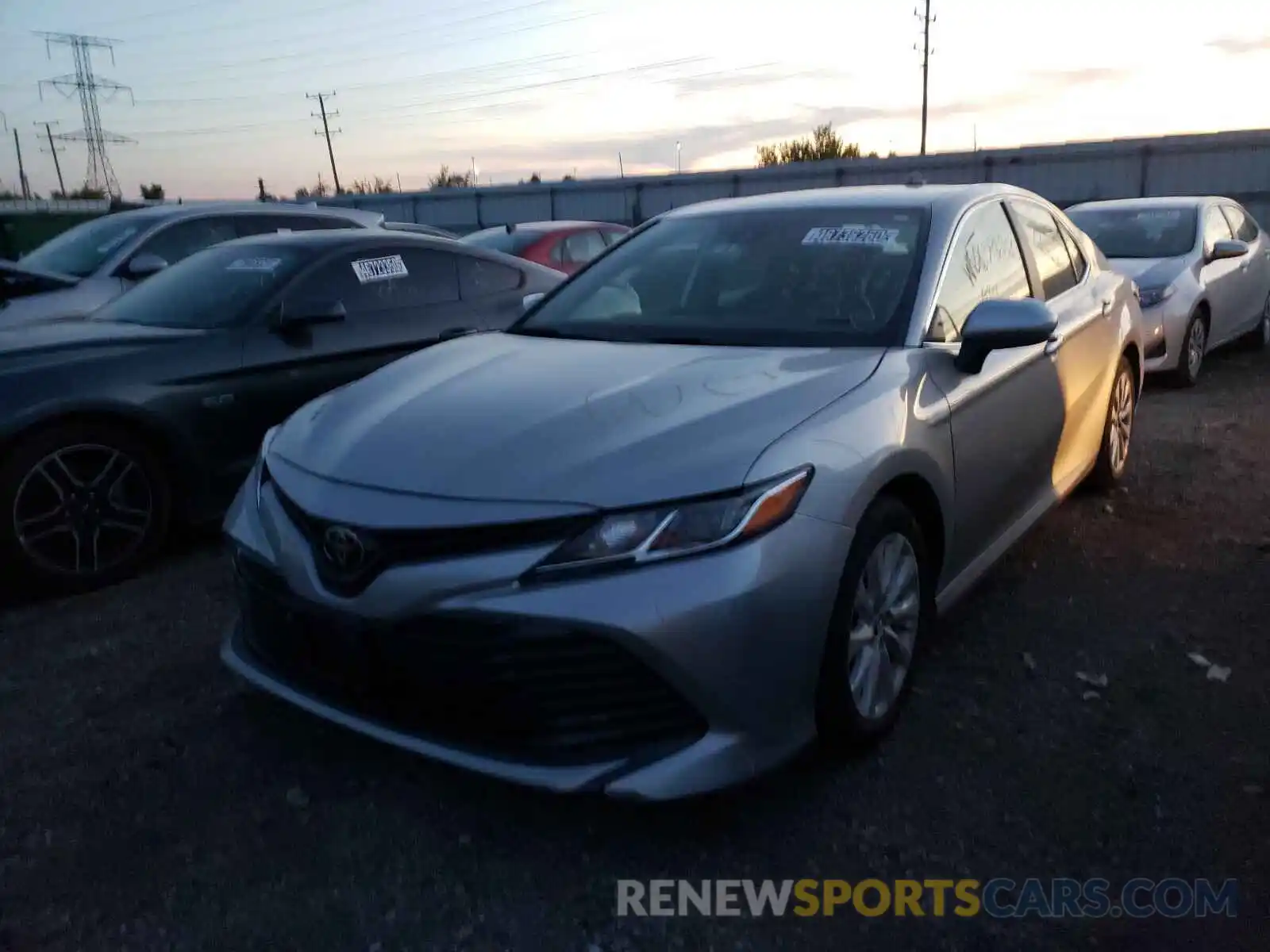 2 Photograph of a damaged car 4T1B11HK4KU786295 TOYOTA CAMRY 2019