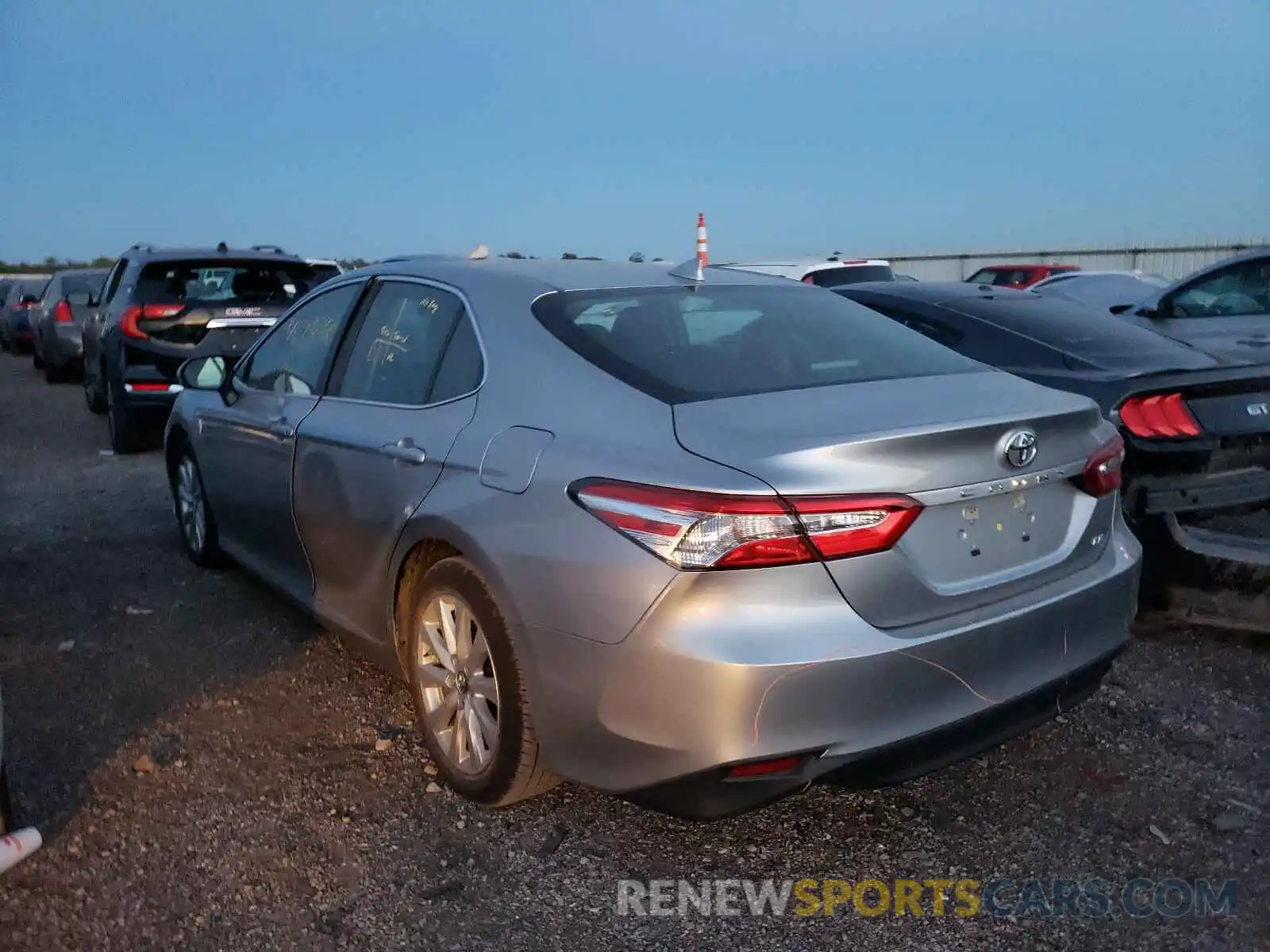 3 Photograph of a damaged car 4T1B11HK4KU786295 TOYOTA CAMRY 2019