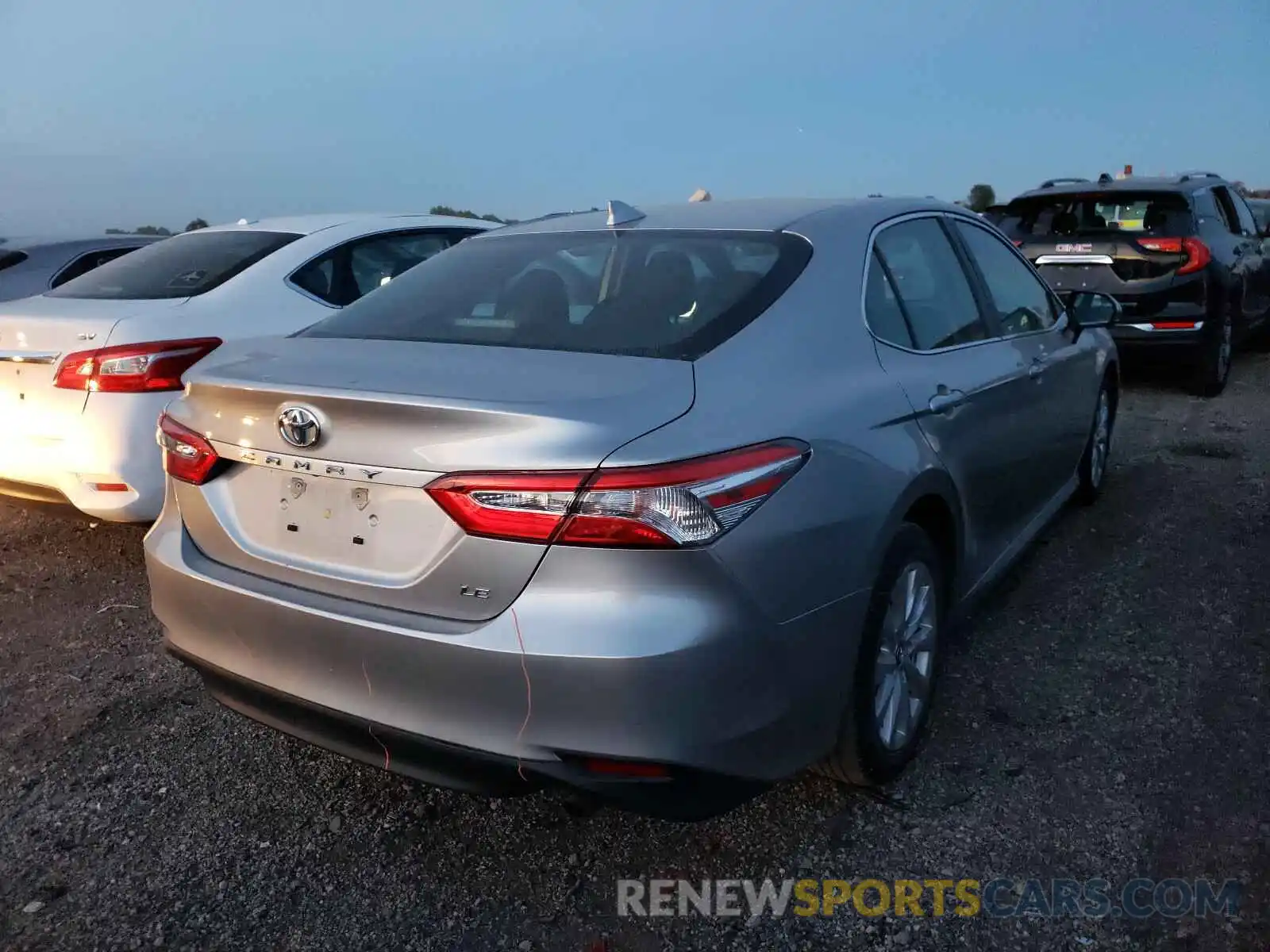 4 Photograph of a damaged car 4T1B11HK4KU786295 TOYOTA CAMRY 2019