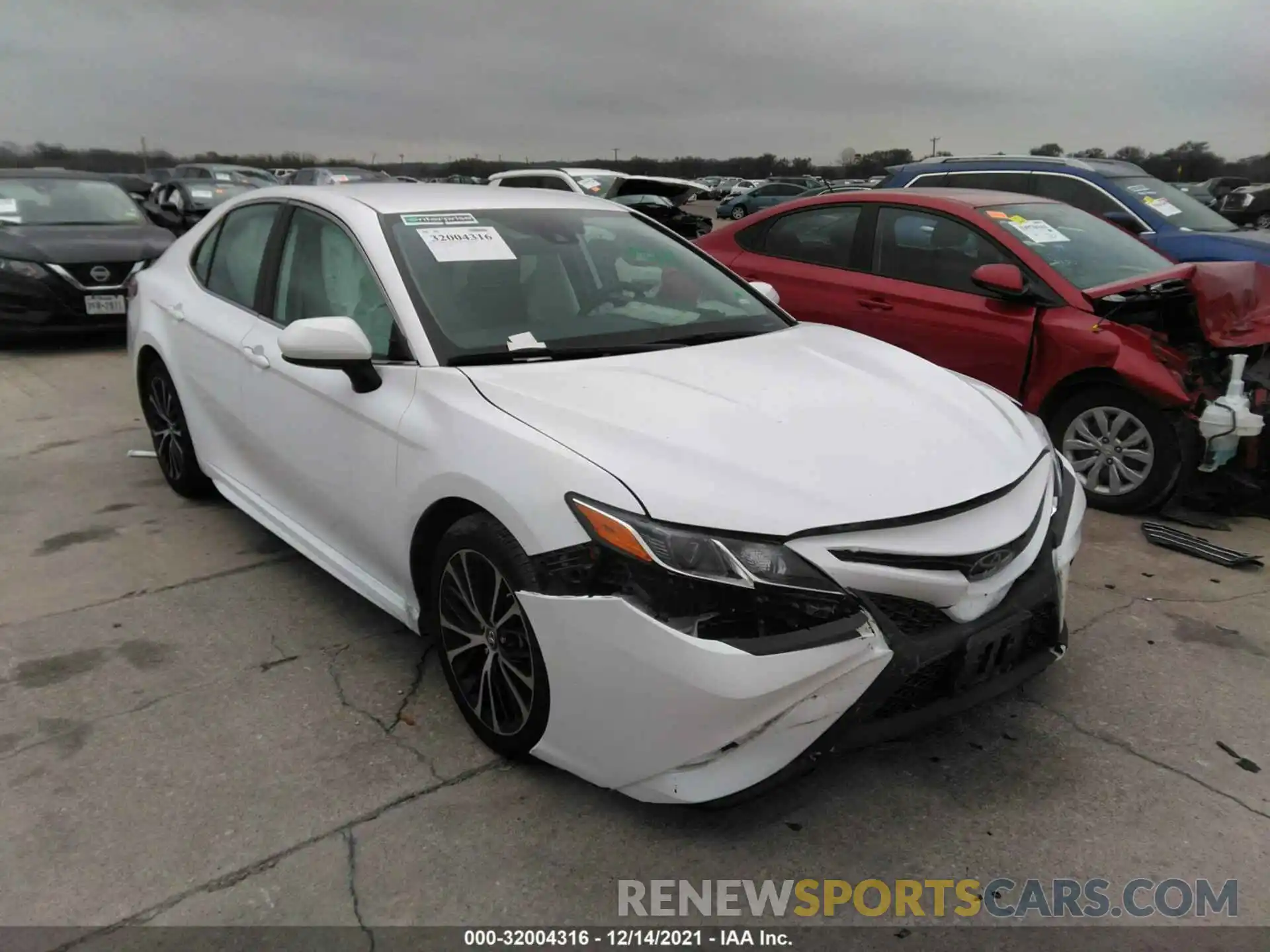 1 Photograph of a damaged car 4T1B11HK4KU786409 TOYOTA CAMRY 2019