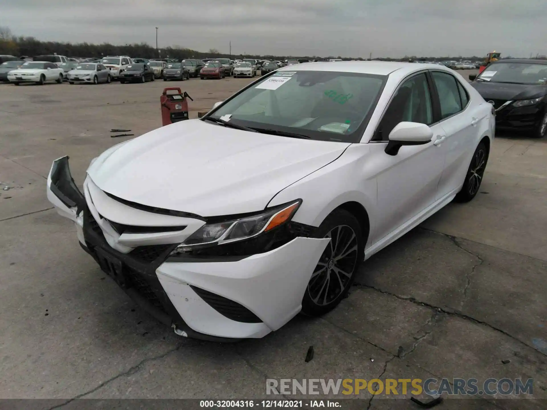 2 Photograph of a damaged car 4T1B11HK4KU786409 TOYOTA CAMRY 2019