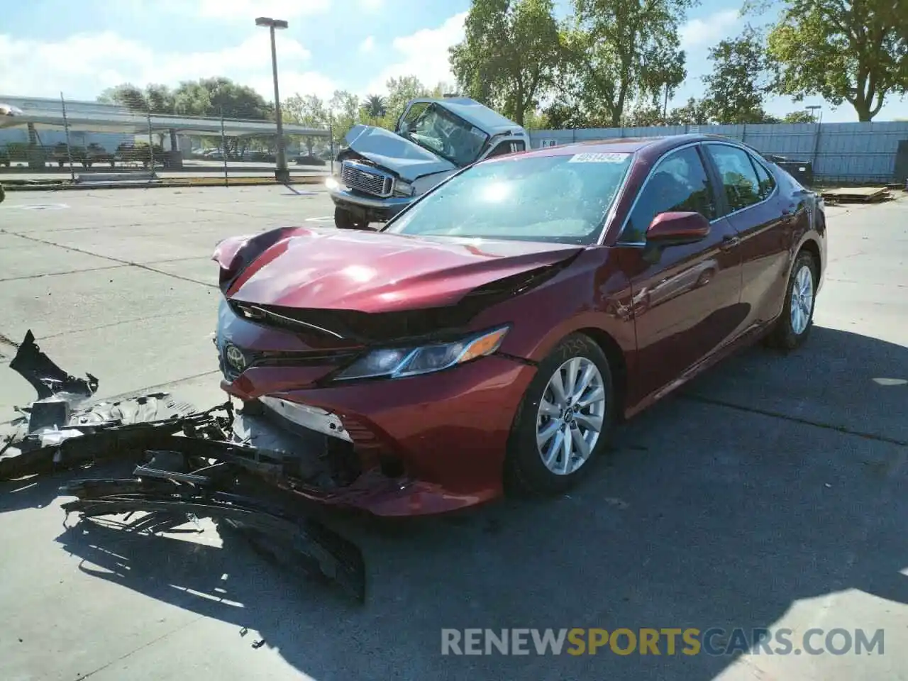 2 Photograph of a damaged car 4T1B11HK4KU787690 TOYOTA CAMRY 2019