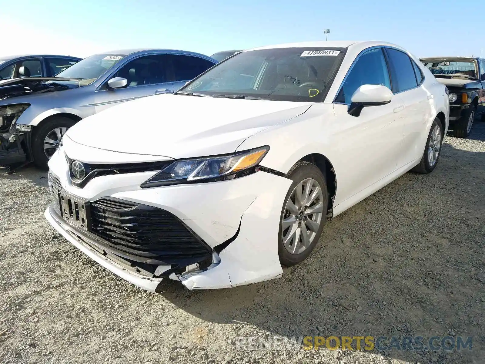 2 Photograph of a damaged car 4T1B11HK4KU787785 TOYOTA CAMRY 2019