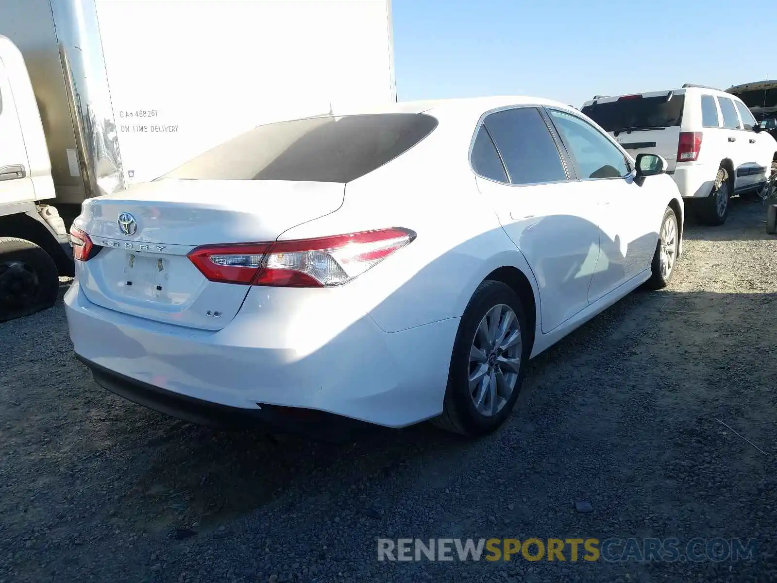 4 Photograph of a damaged car 4T1B11HK4KU787785 TOYOTA CAMRY 2019