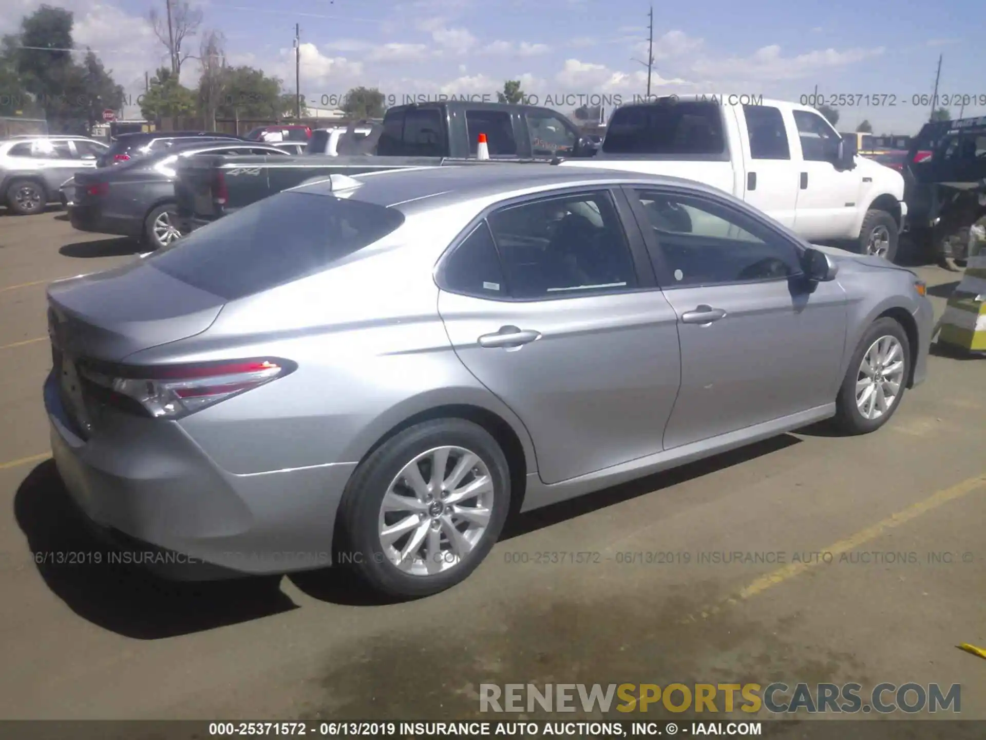 4 Photograph of a damaged car 4T1B11HK4KU790886 TOYOTA CAMRY 2019