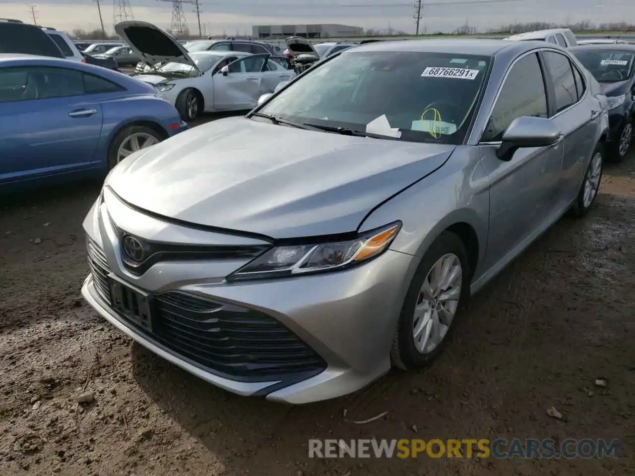 2 Photograph of a damaged car 4T1B11HK4KU792176 TOYOTA CAMRY 2019