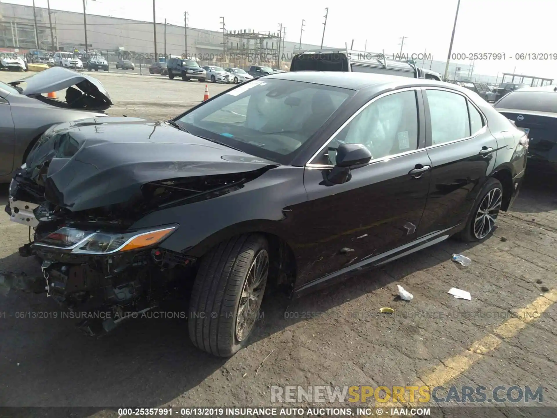 2 Photograph of a damaged car 4T1B11HK4KU792520 TOYOTA CAMRY 2019