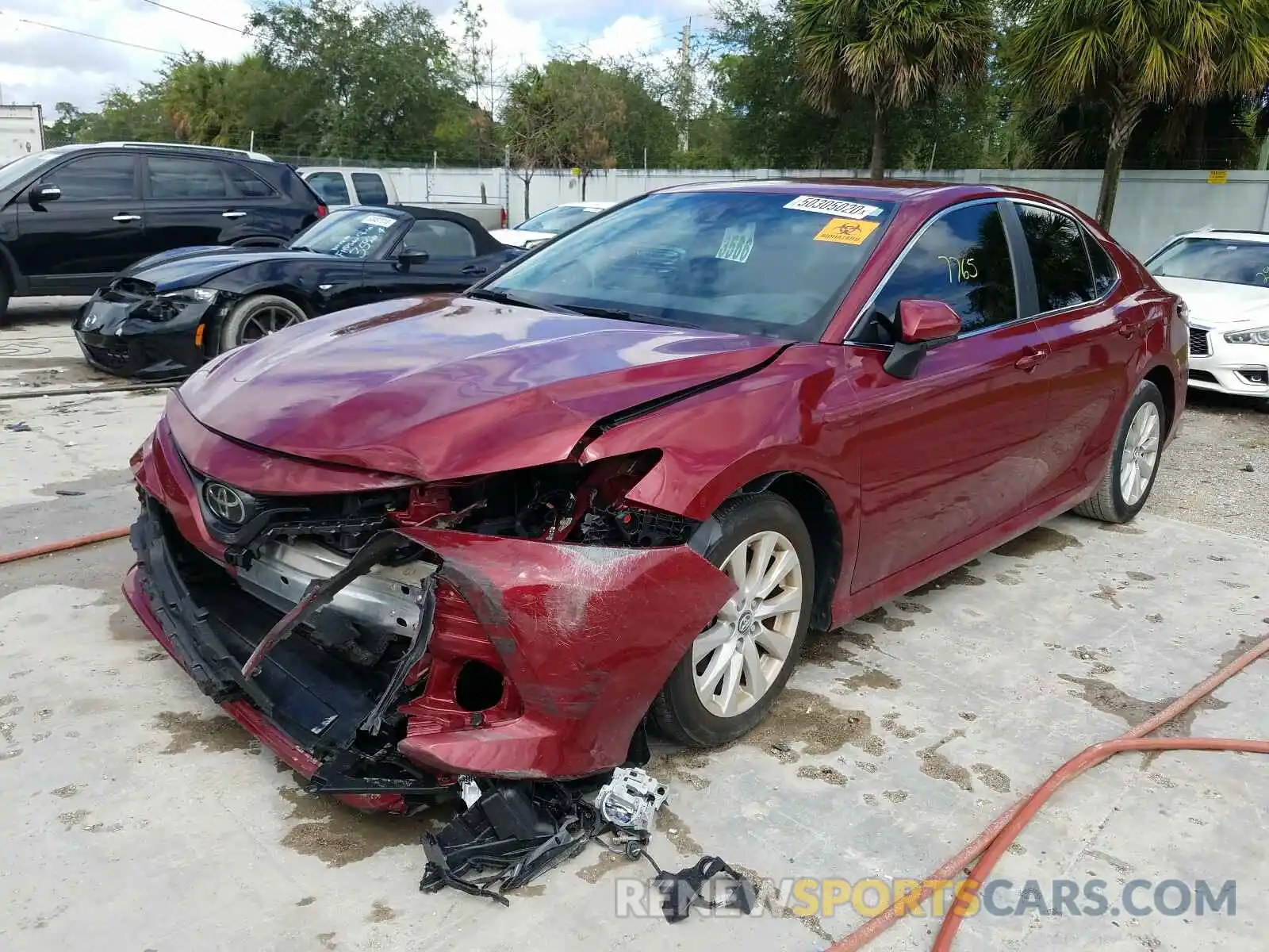 2 Photograph of a damaged car 4T1B11HK4KU792758 TOYOTA CAMRY 2019