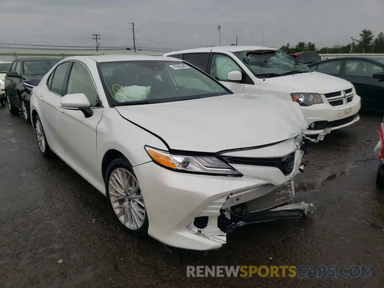 1 Photograph of a damaged car 4T1B11HK4KU794316 TOYOTA CAMRY 2019