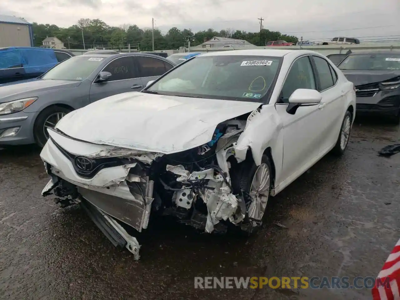 2 Photograph of a damaged car 4T1B11HK4KU794316 TOYOTA CAMRY 2019