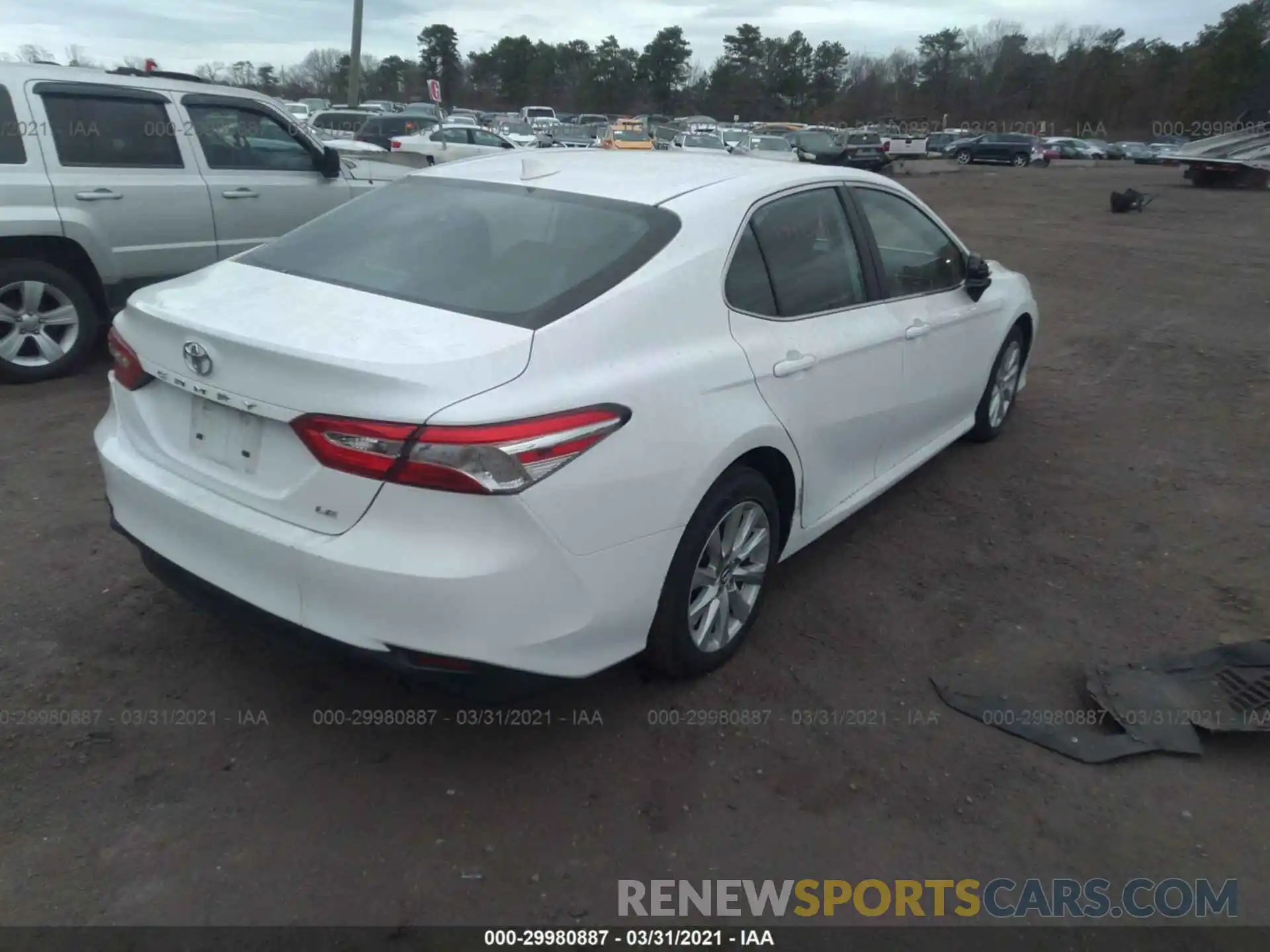 4 Photograph of a damaged car 4T1B11HK4KU794493 TOYOTA CAMRY 2019