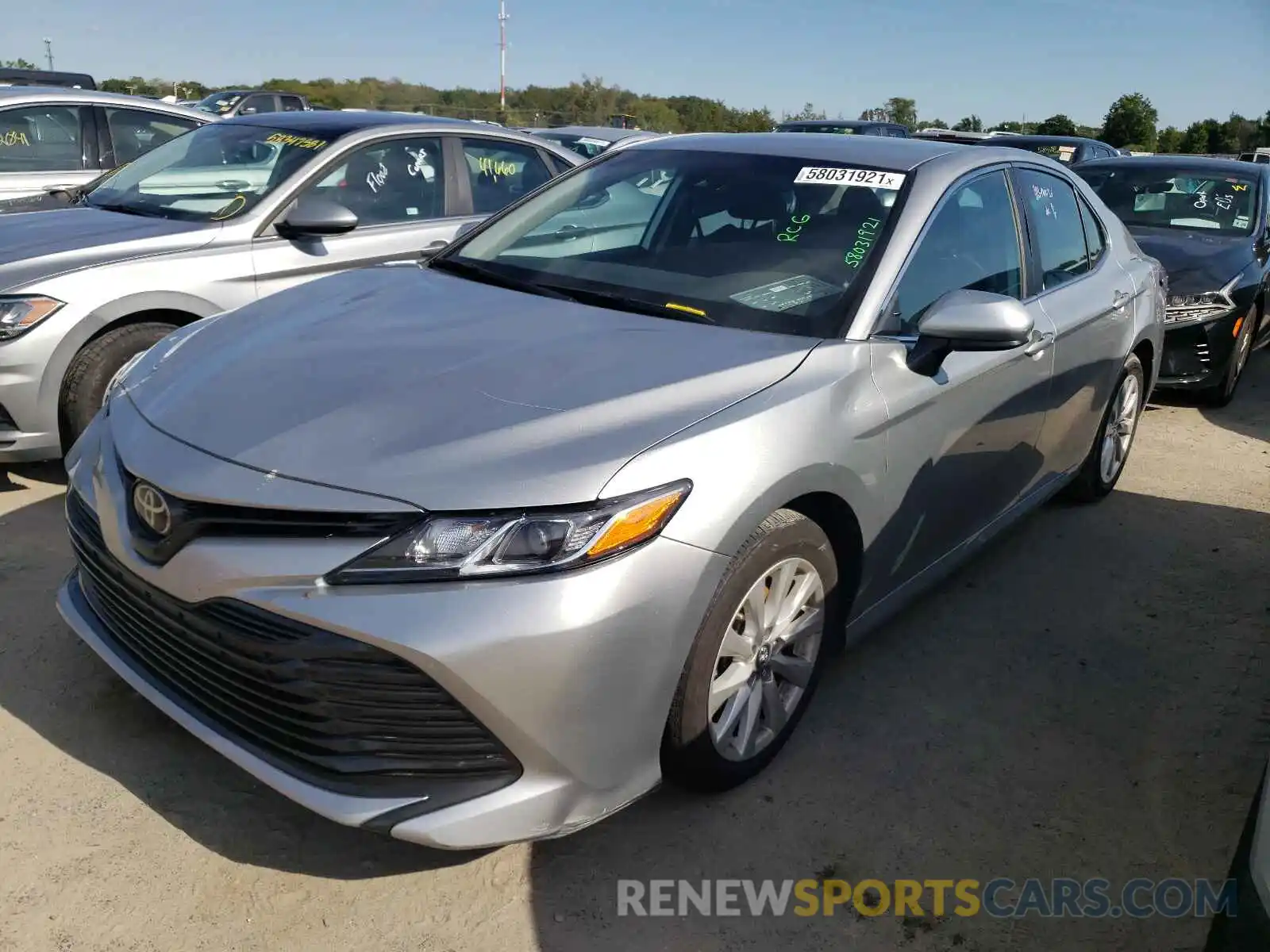 2 Photograph of a damaged car 4T1B11HK4KU795403 TOYOTA CAMRY 2019