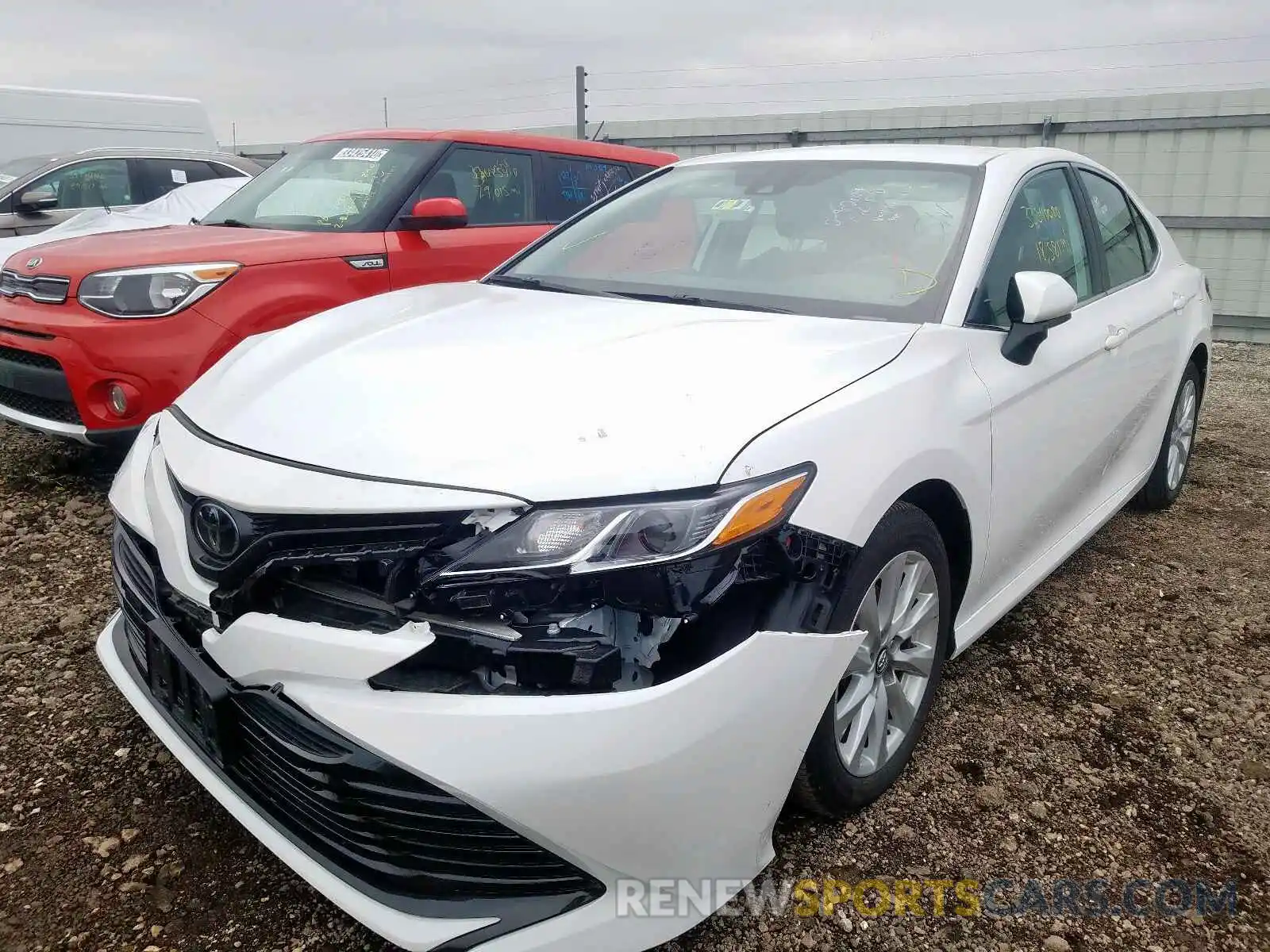 2 Photograph of a damaged car 4T1B11HK4KU797751 TOYOTA CAMRY 2019