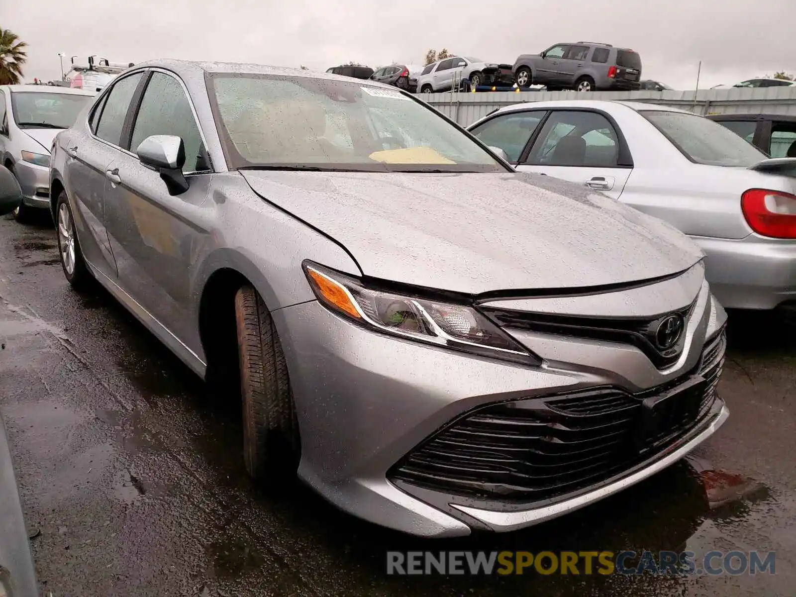 1 Photograph of a damaged car 4T1B11HK4KU801555 TOYOTA CAMRY 2019