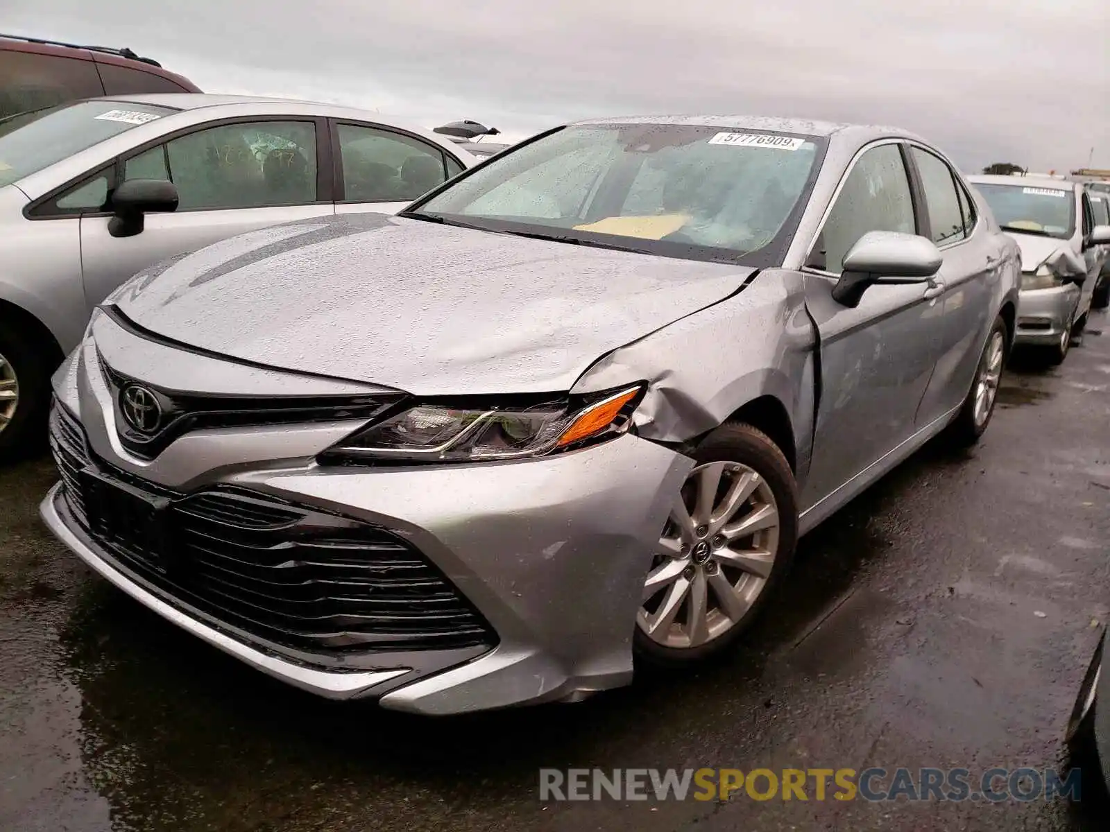 2 Photograph of a damaged car 4T1B11HK4KU801555 TOYOTA CAMRY 2019