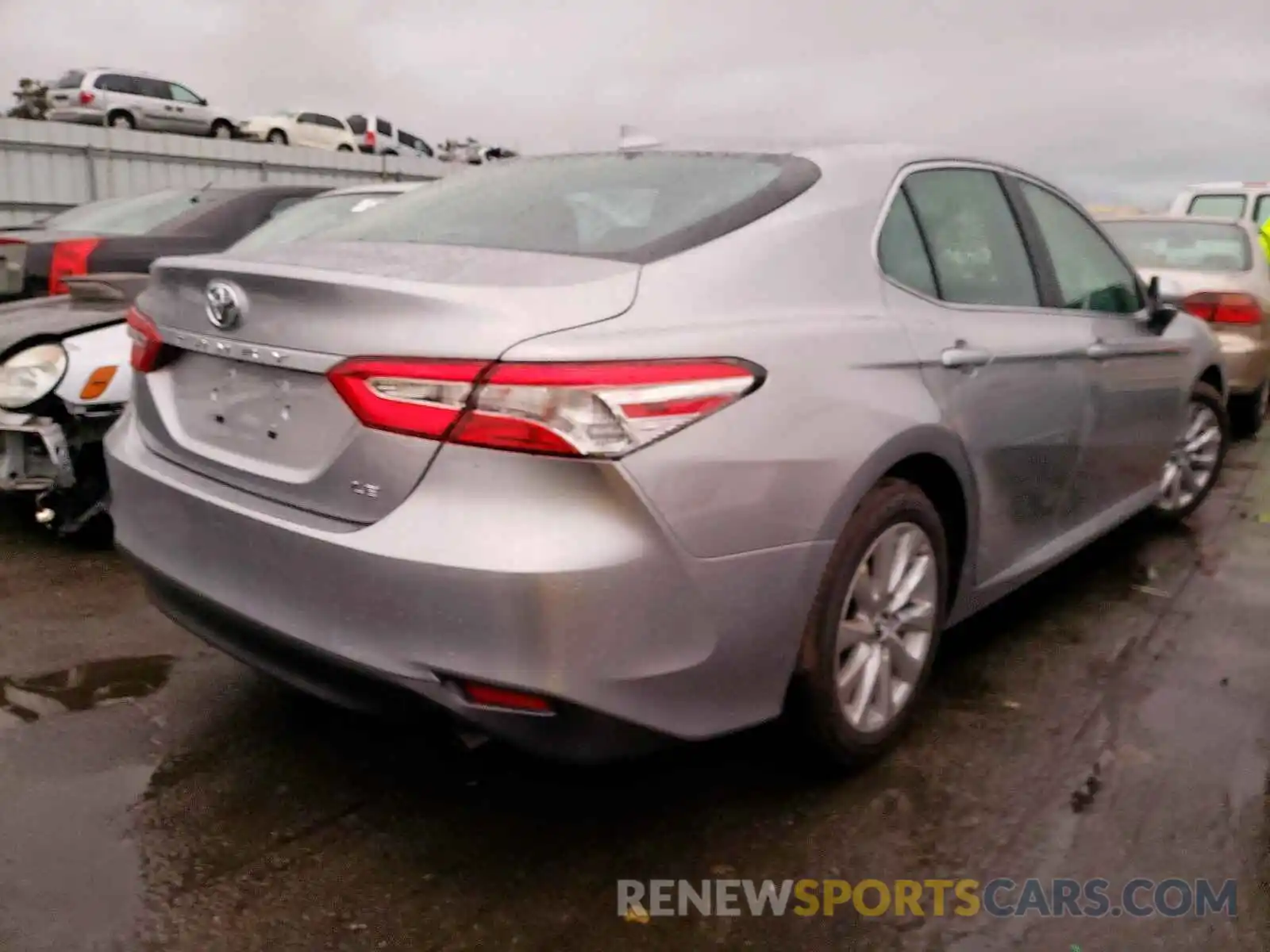 4 Photograph of a damaged car 4T1B11HK4KU801555 TOYOTA CAMRY 2019