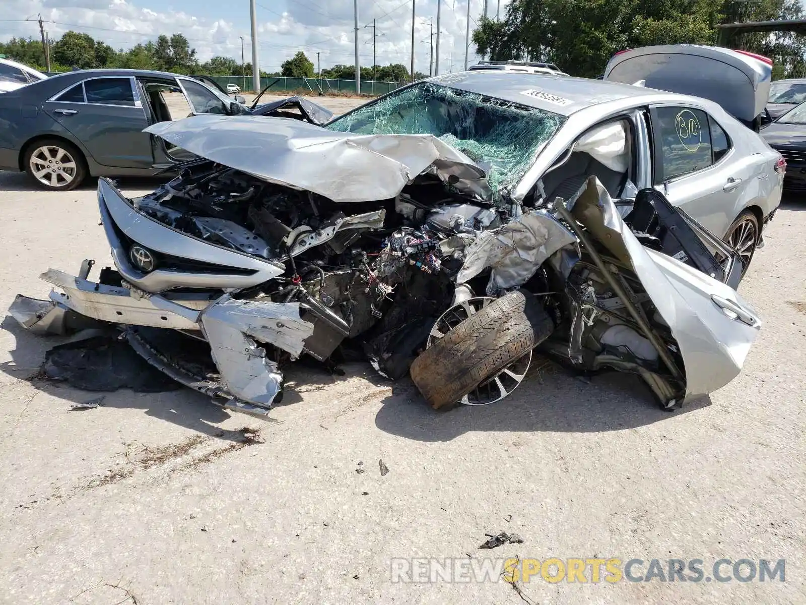 2 Photograph of a damaged car 4T1B11HK4KU801572 TOYOTA CAMRY 2019