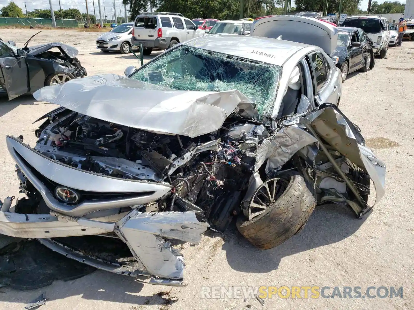 9 Photograph of a damaged car 4T1B11HK4KU801572 TOYOTA CAMRY 2019