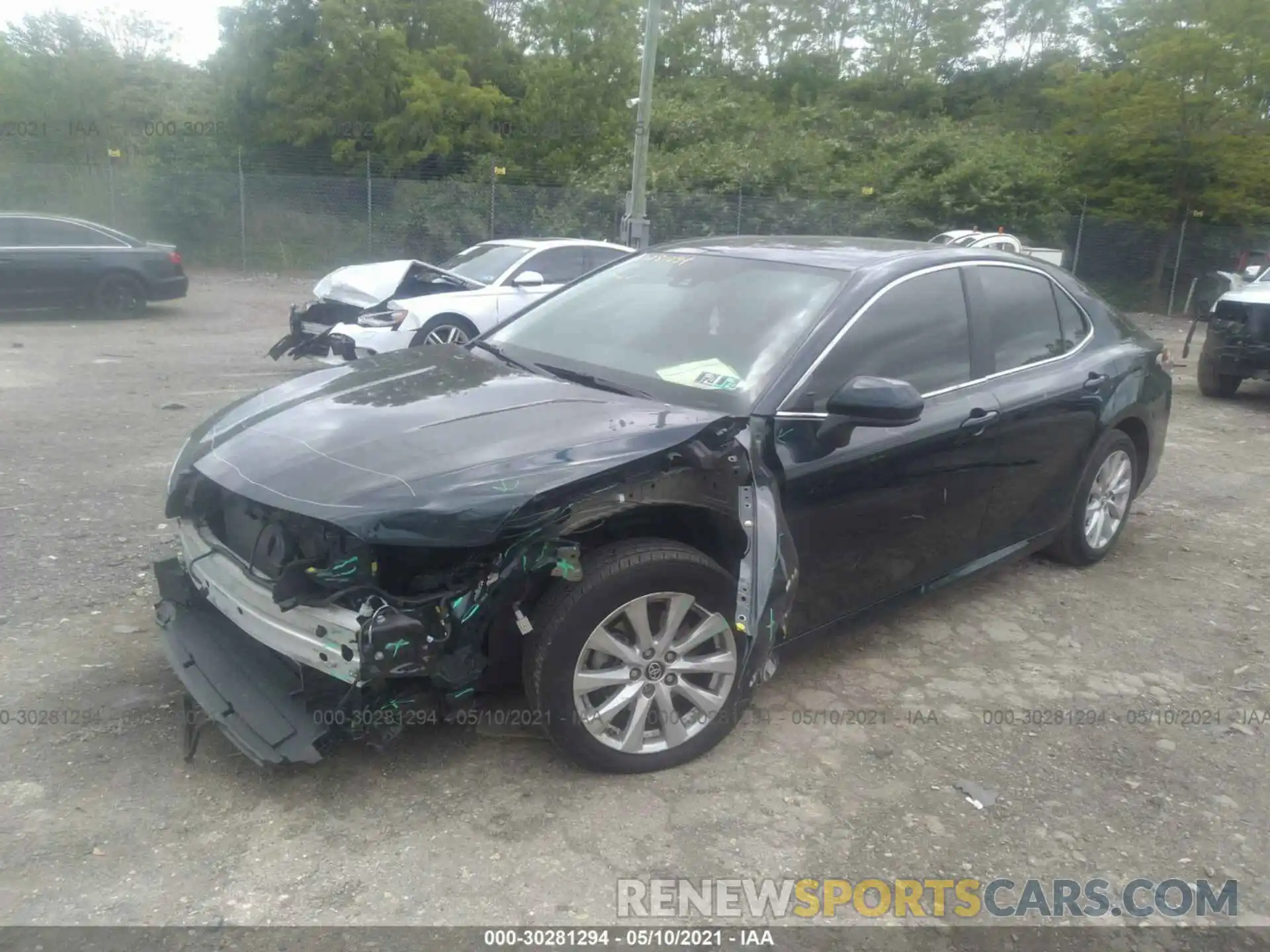 2 Photograph of a damaged car 4T1B11HK4KU802124 TOYOTA CAMRY 2019