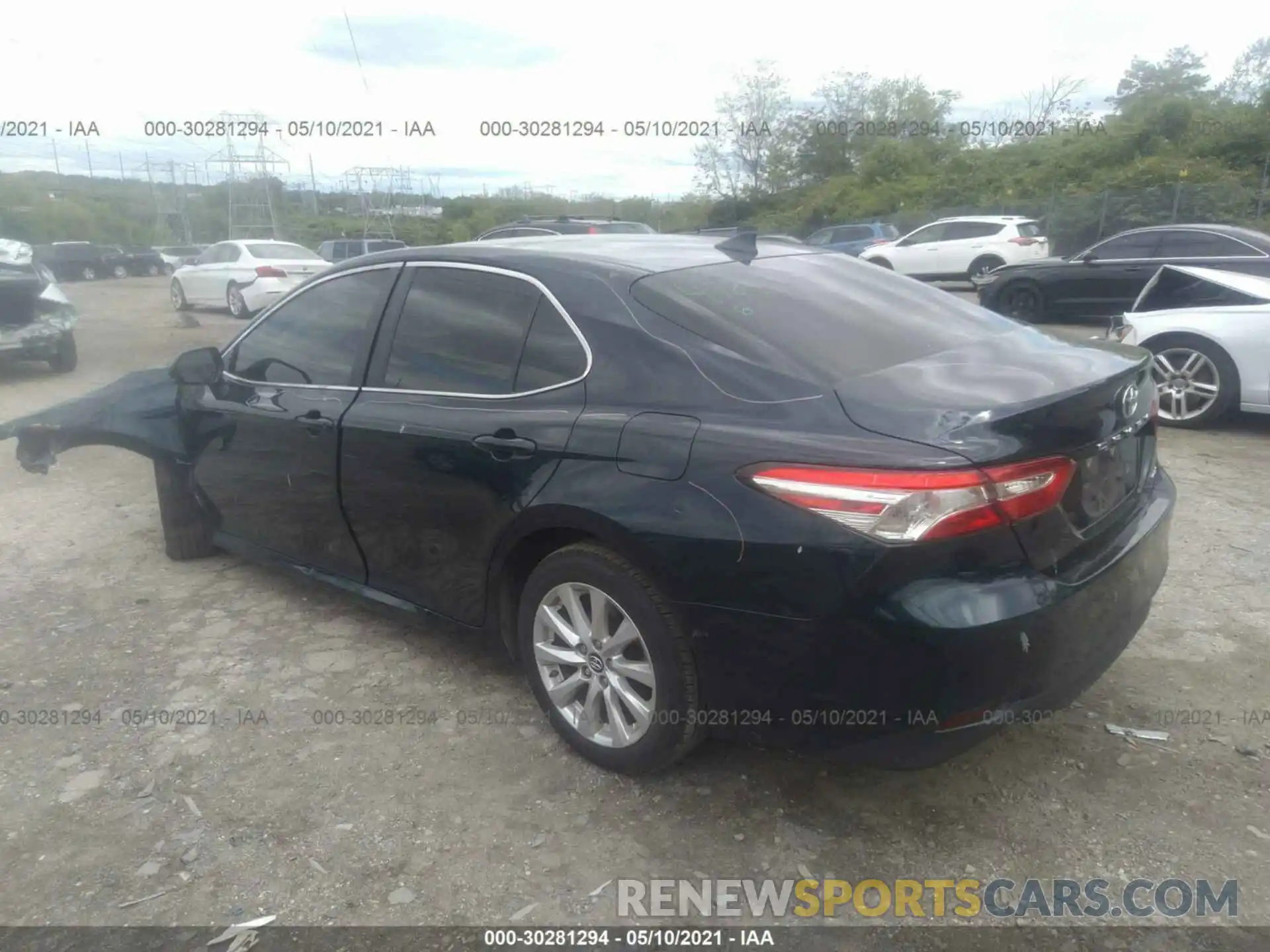 3 Photograph of a damaged car 4T1B11HK4KU802124 TOYOTA CAMRY 2019