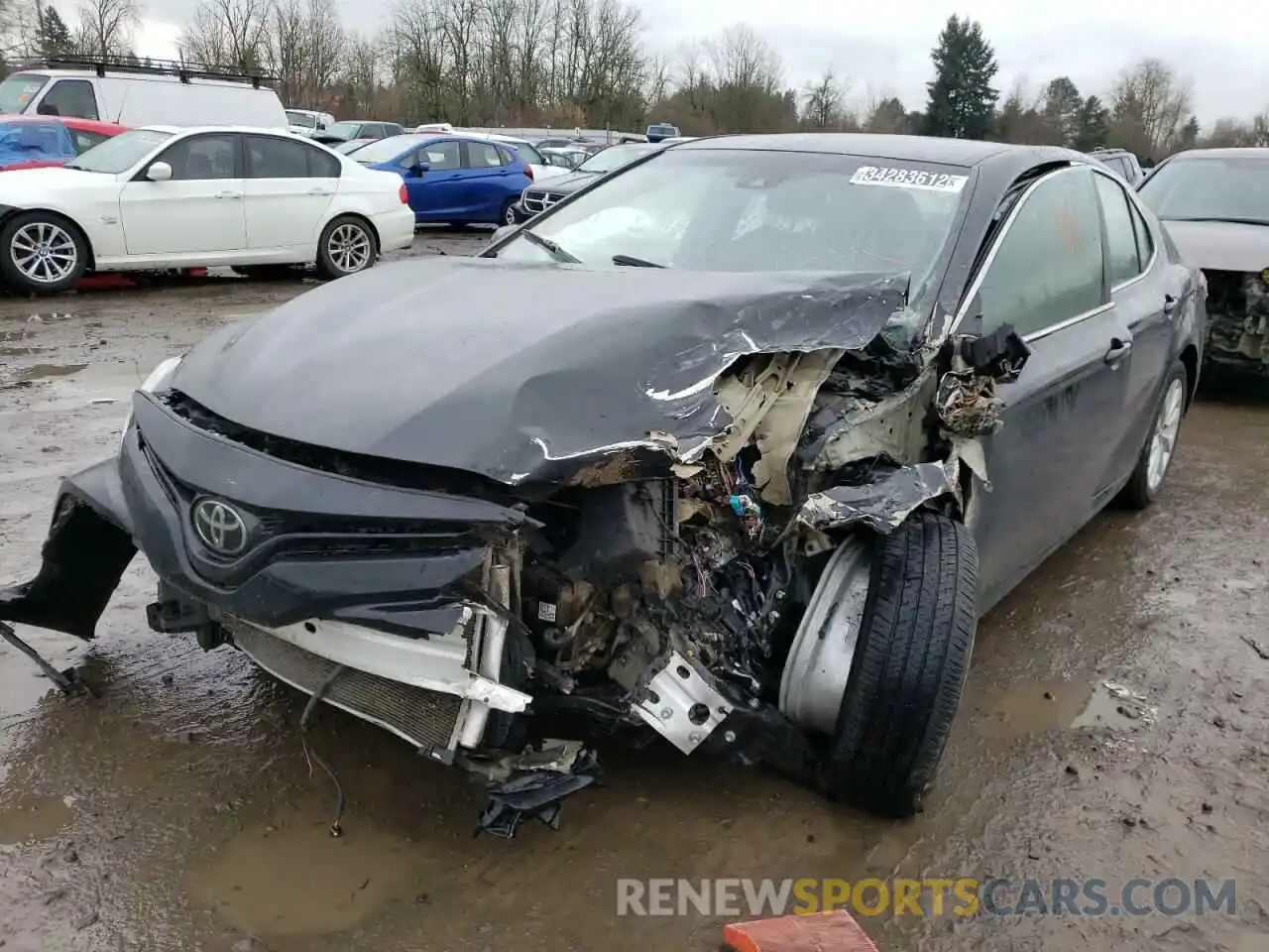 2 Photograph of a damaged car 4T1B11HK4KU802382 TOYOTA CAMRY 2019