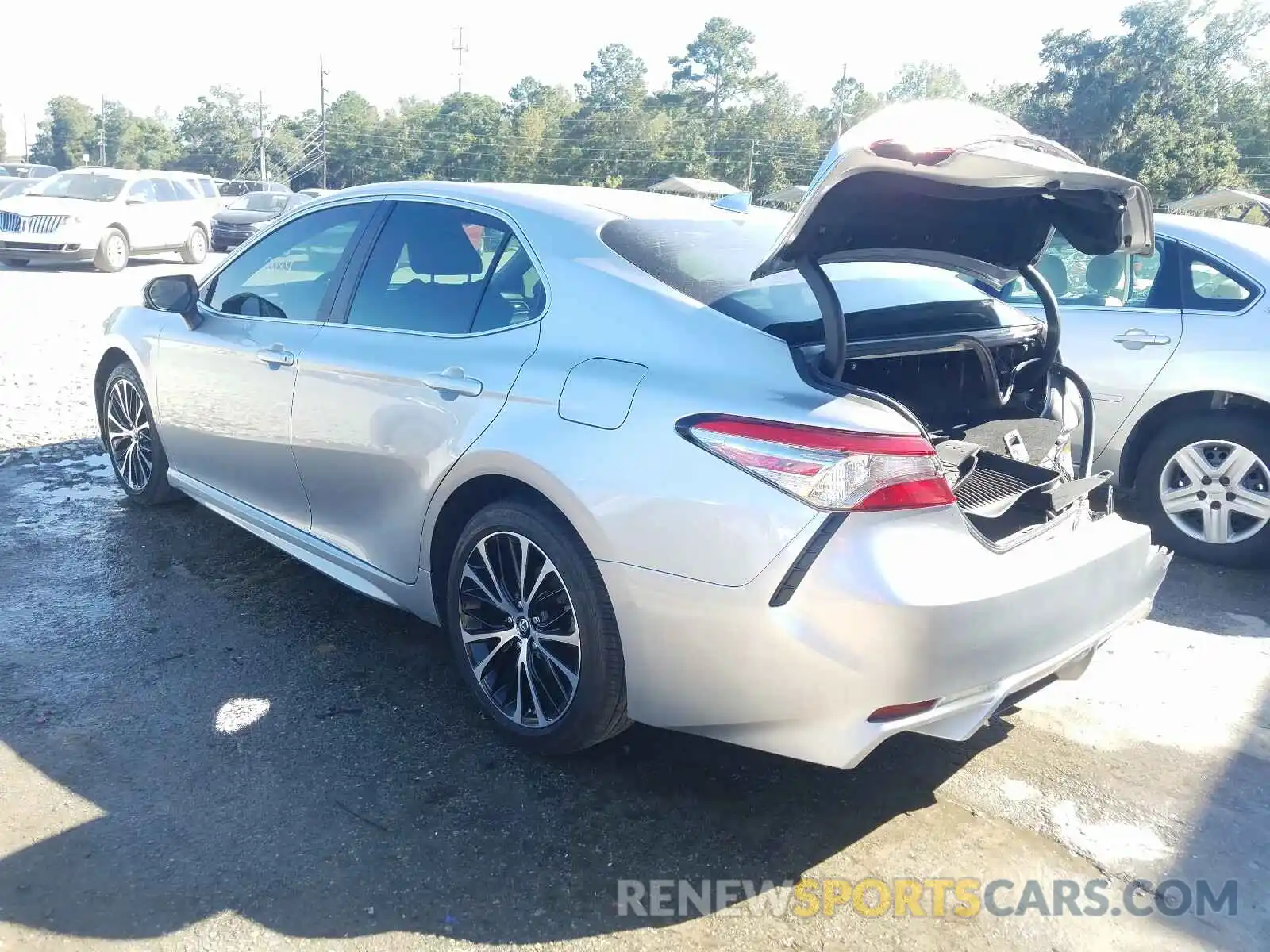 3 Photograph of a damaged car 4T1B11HK4KU802592 TOYOTA CAMRY 2019