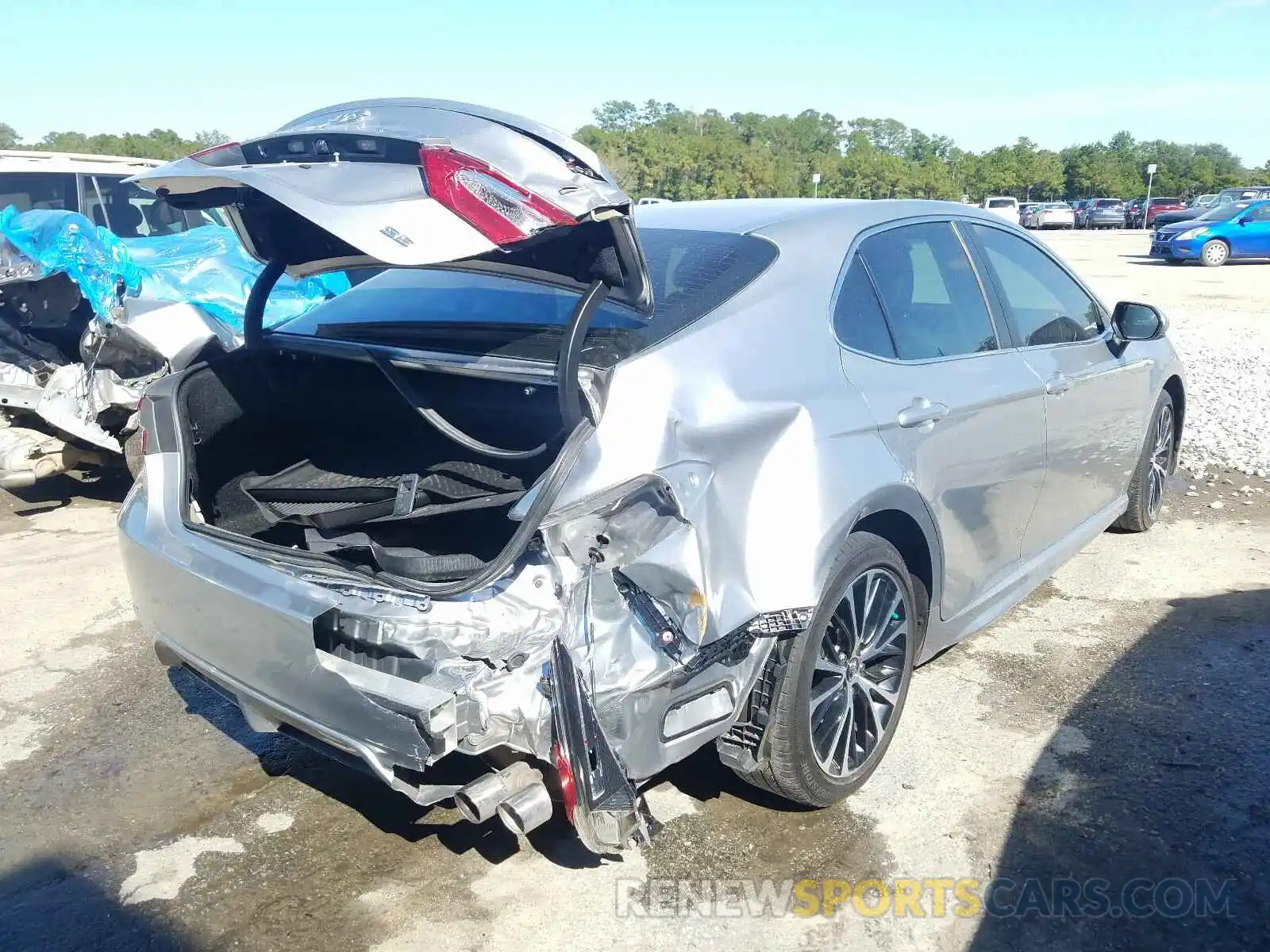 4 Photograph of a damaged car 4T1B11HK4KU802592 TOYOTA CAMRY 2019