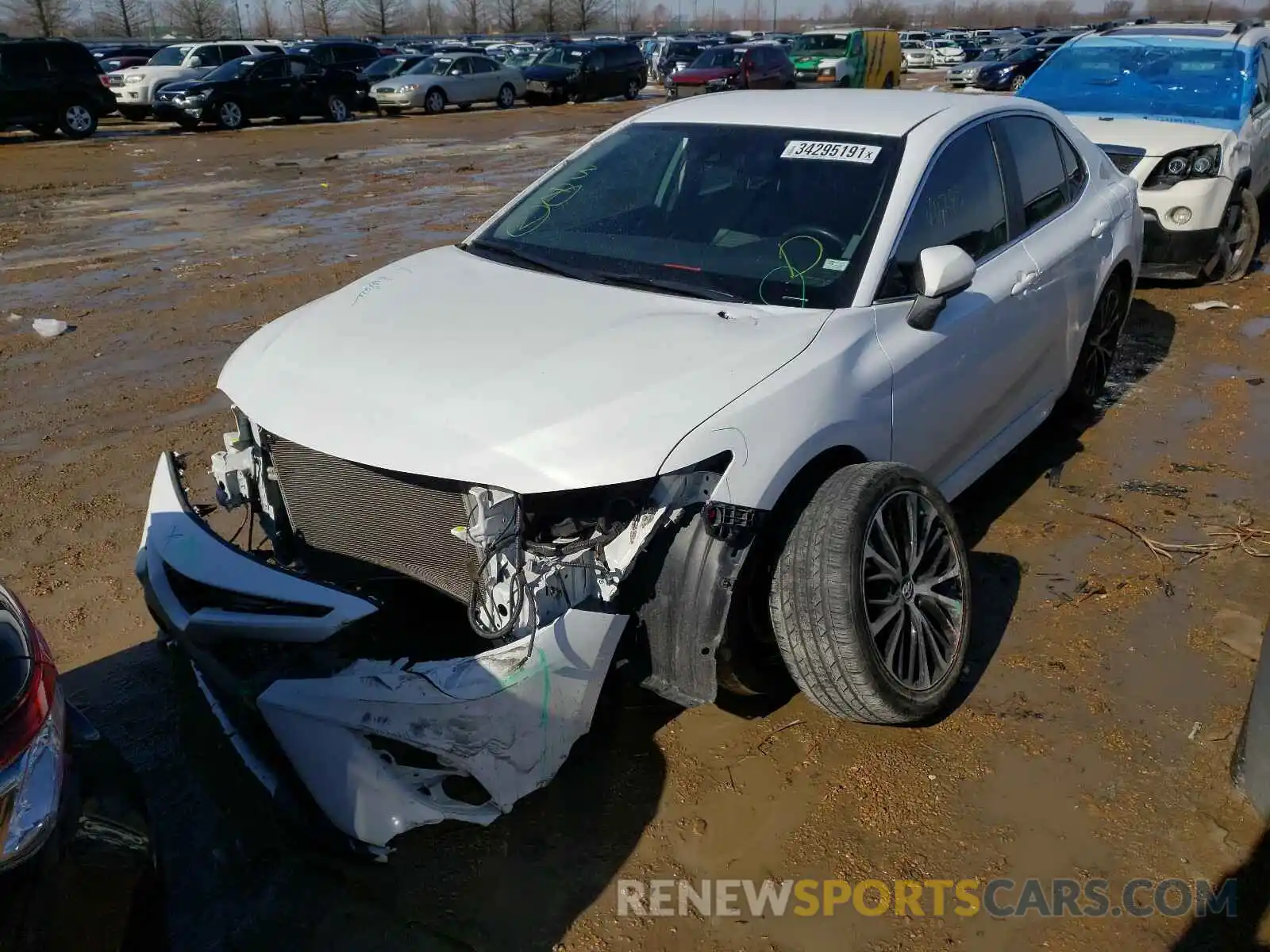 2 Photograph of a damaged car 4T1B11HK4KU802818 TOYOTA CAMRY 2019