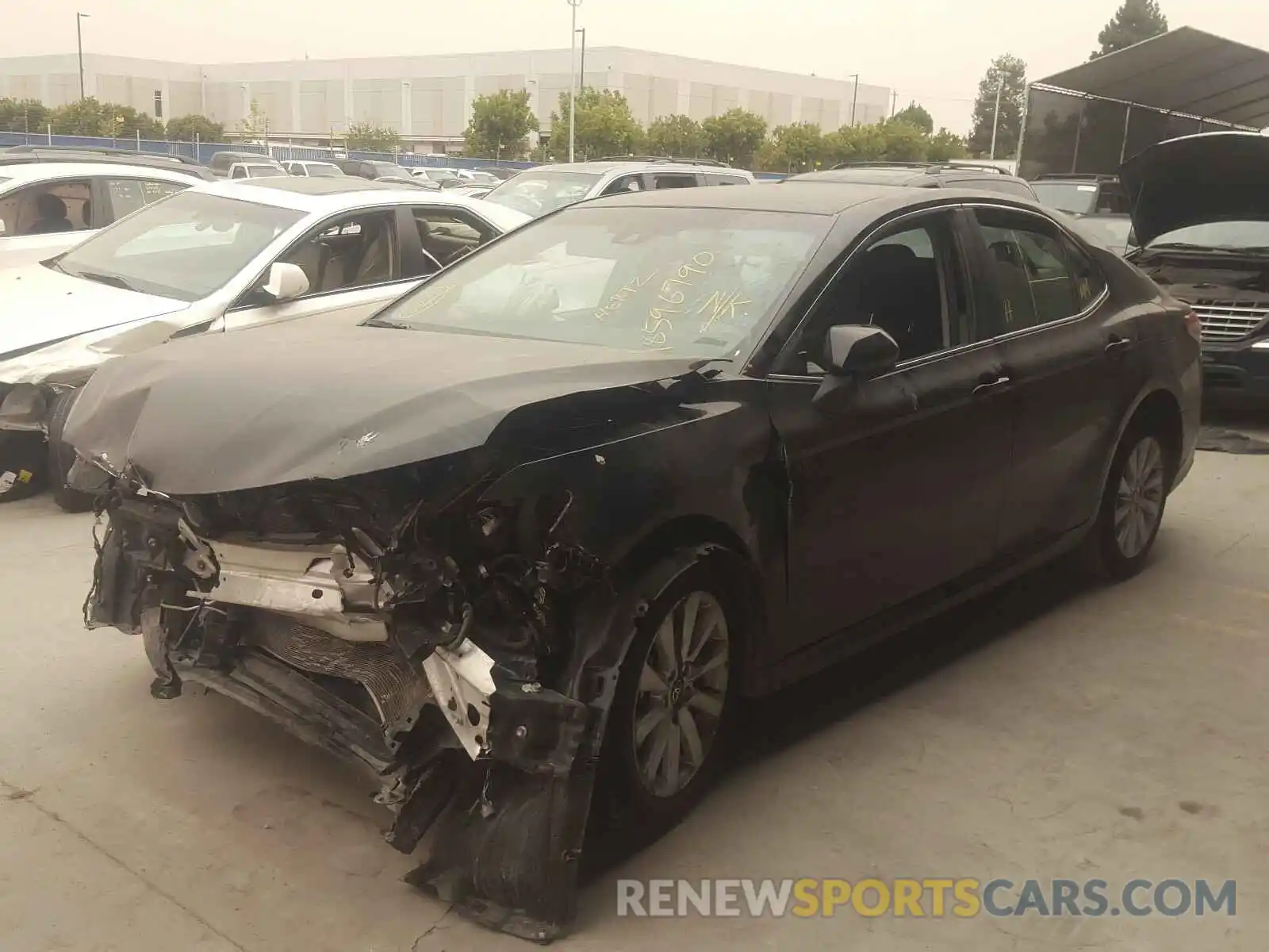 2 Photograph of a damaged car 4T1B11HK4KU804052 TOYOTA CAMRY 2019