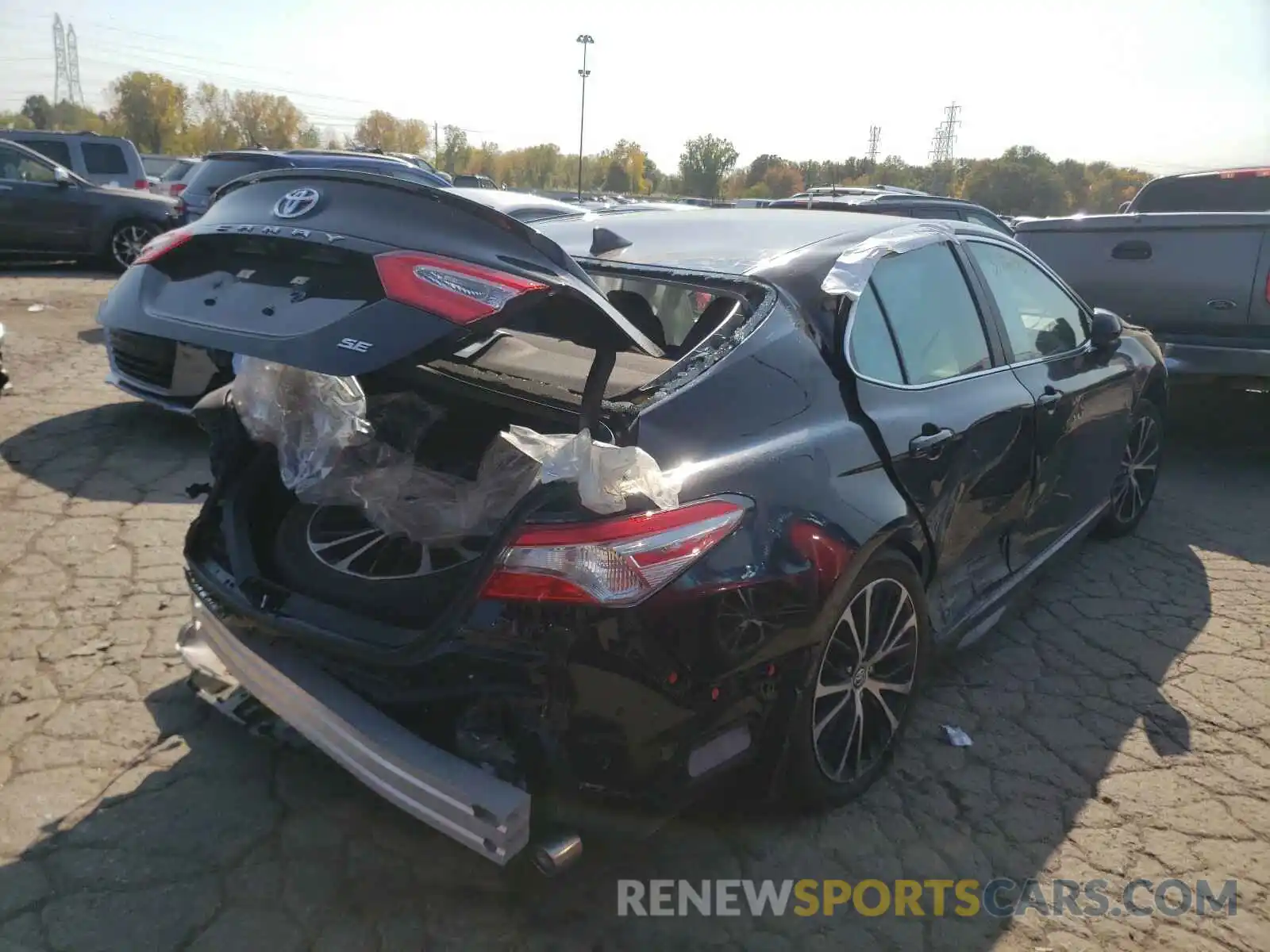 4 Photograph of a damaged car 4T1B11HK4KU804519 TOYOTA CAMRY 2019