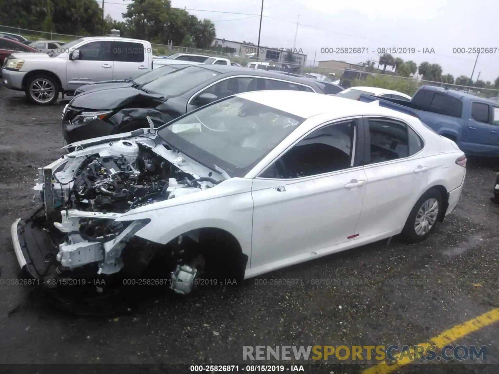 2 Photograph of a damaged car 4T1B11HK4KU806979 TOYOTA CAMRY 2019