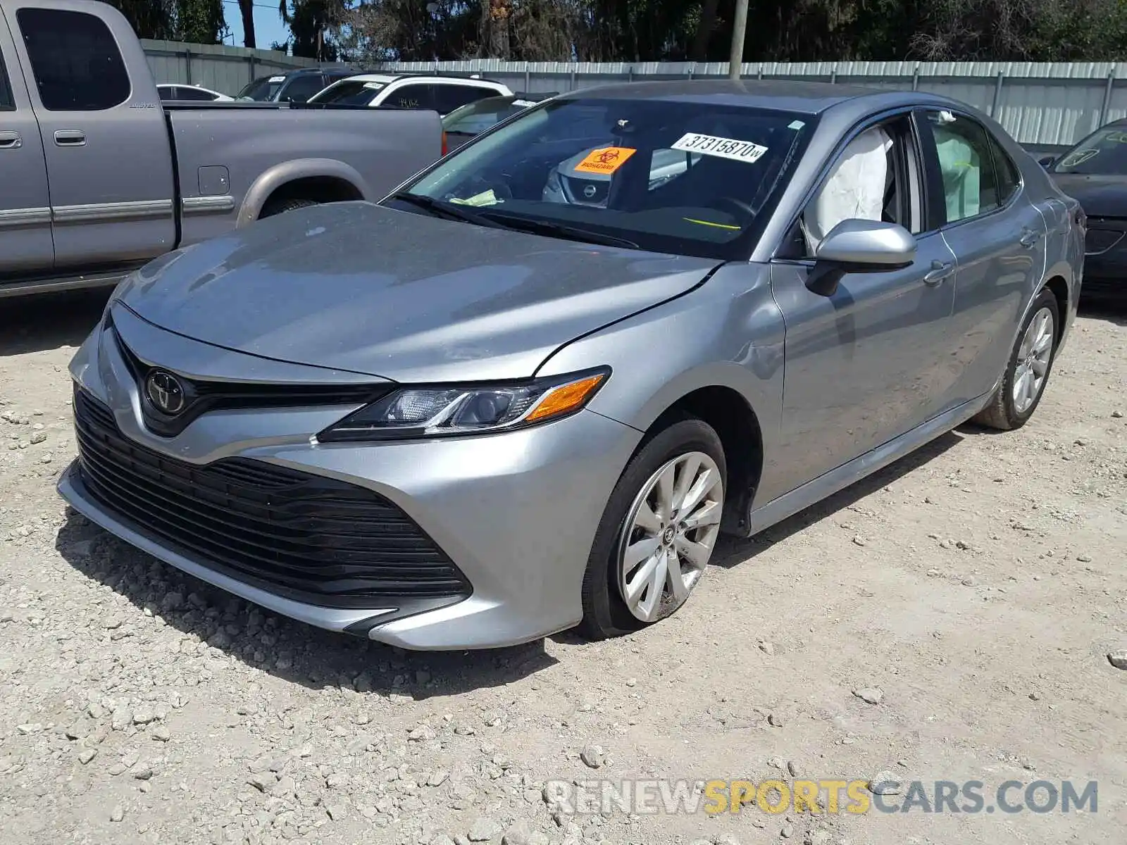 2 Photograph of a damaged car 4T1B11HK4KU807193 TOYOTA CAMRY 2019